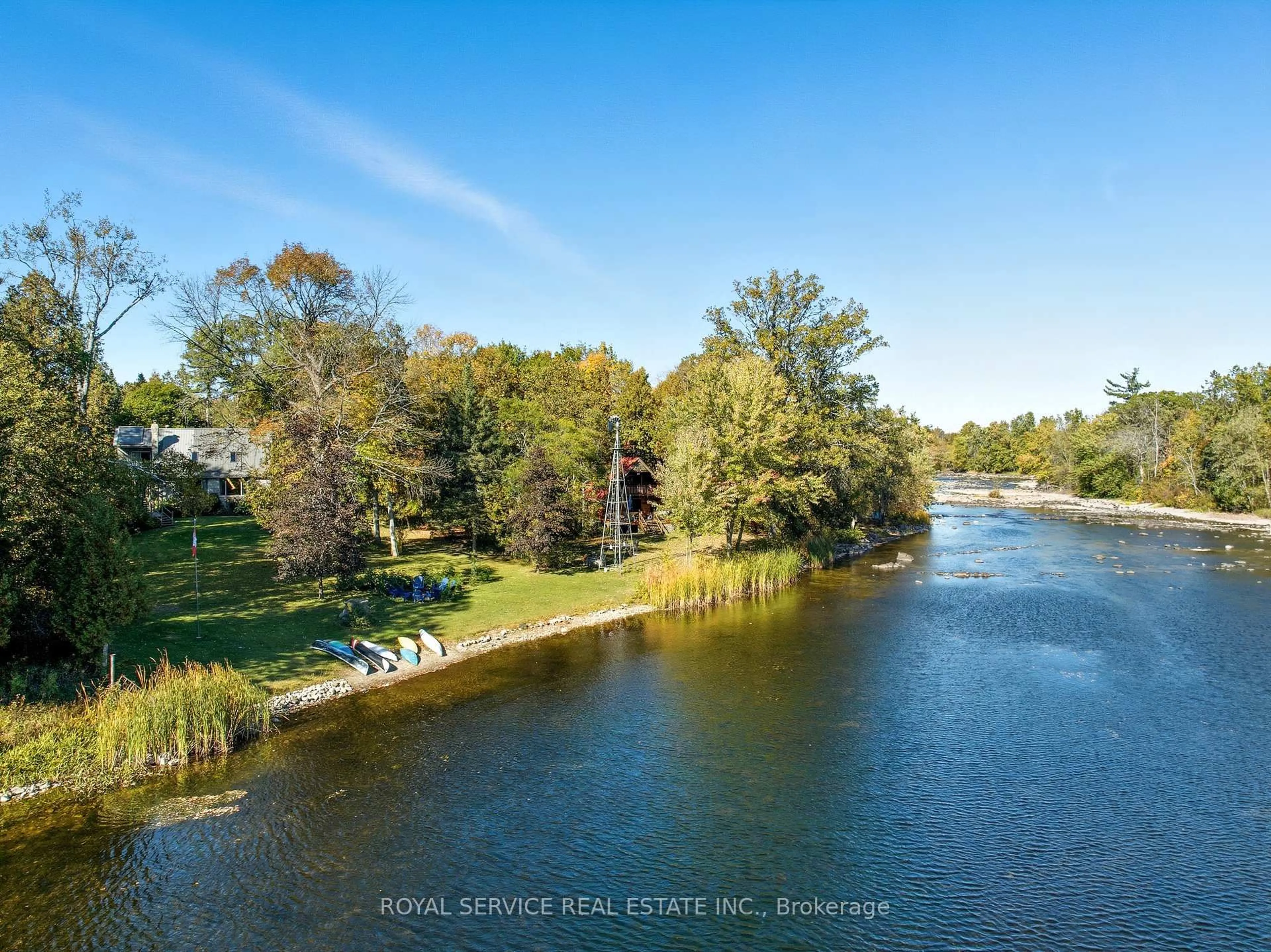 A pic from outside/outdoor area/front of a property/back of a property/a pic from drone, water/lake/river/ocean view for 2853 13th Line, Trent Hills Ontario K0K 2M0