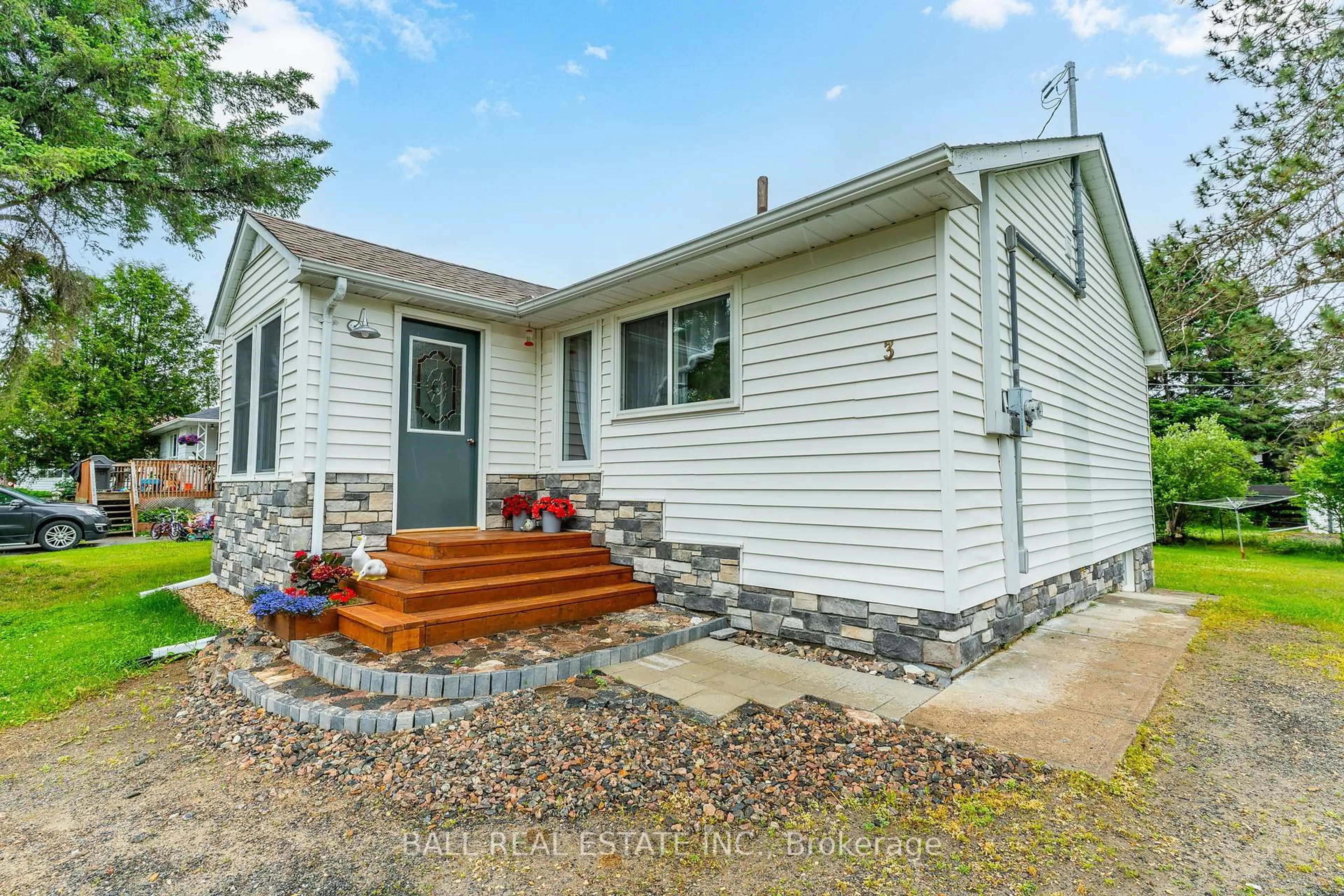 Home with vinyl exterior material, street for 3 Larch St, Highlands East Ontario K0L 1M0