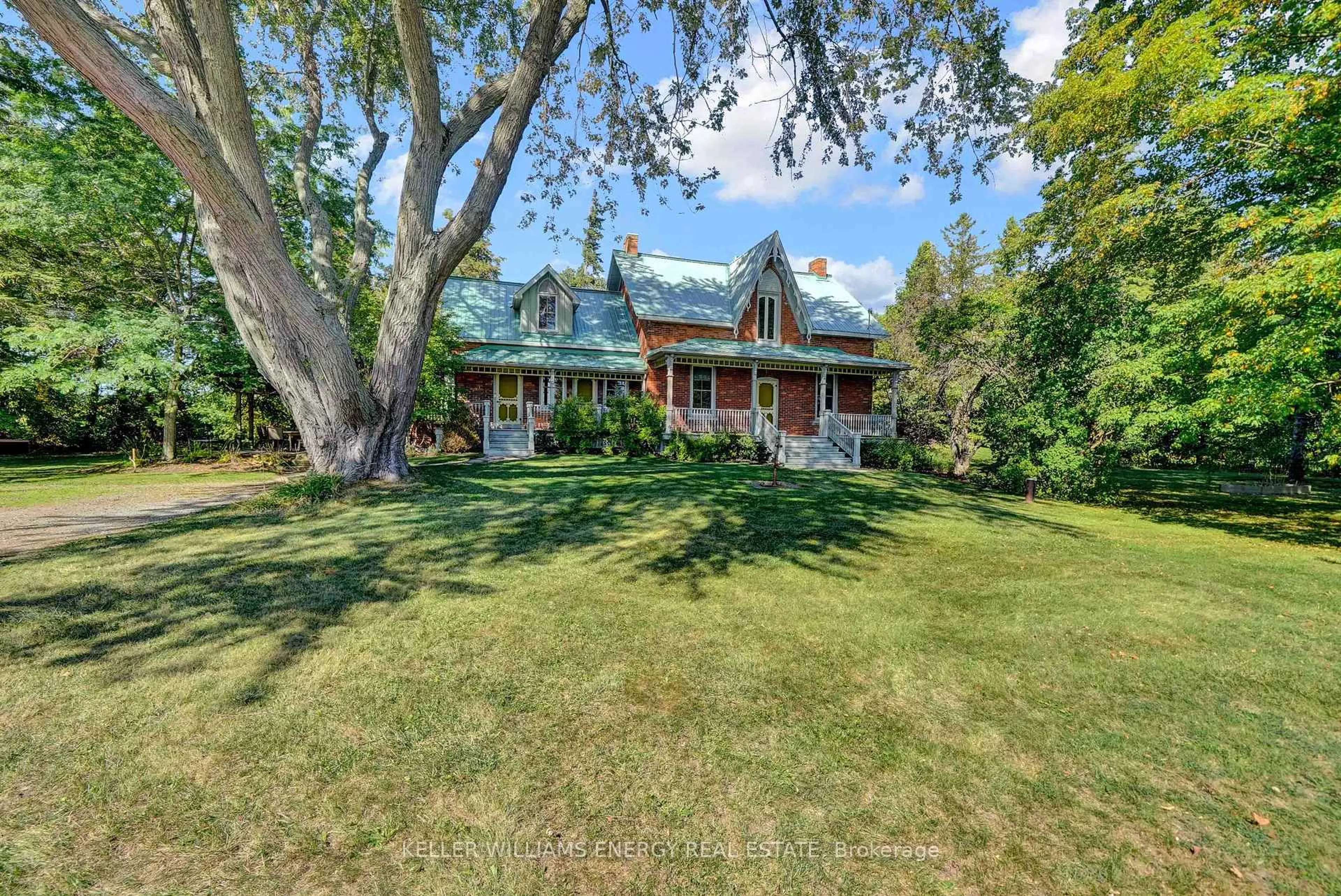 A pic from outside/outdoor area/front of a property/back of a property/a pic from drone, street for 1356 County Road 11, Prince Edward County Ontario K0K 2T0