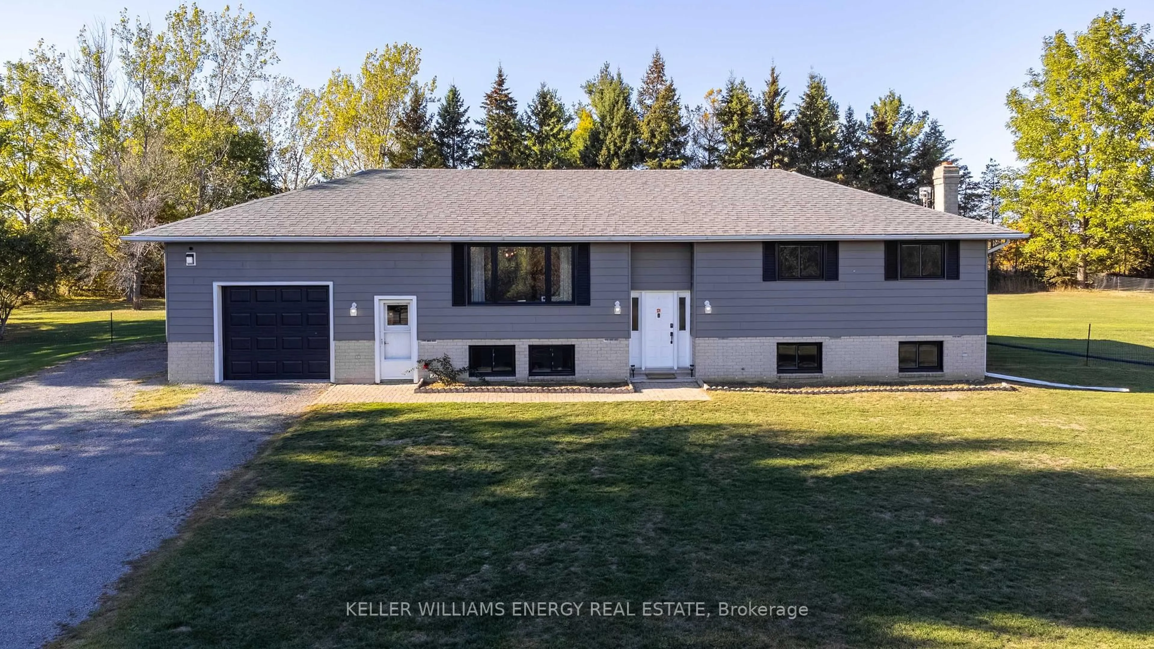 Home with vinyl exterior material, street for 106 Oram Rd, Prince Edward County Ontario K0K 1G0