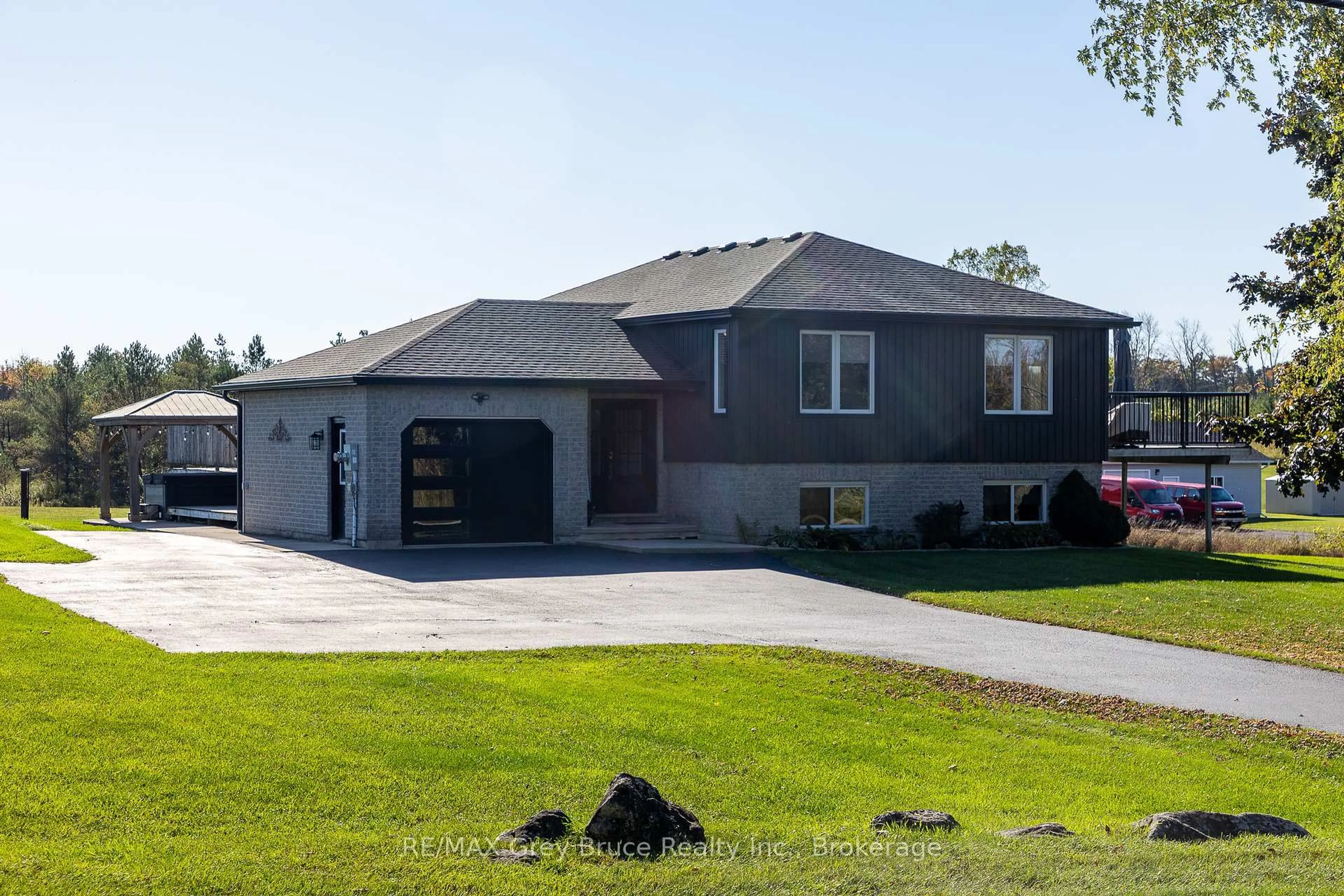 Home with brick exterior material, street for 200050 10 Sdrd, Georgian Bluffs Ontario N0H 2K0