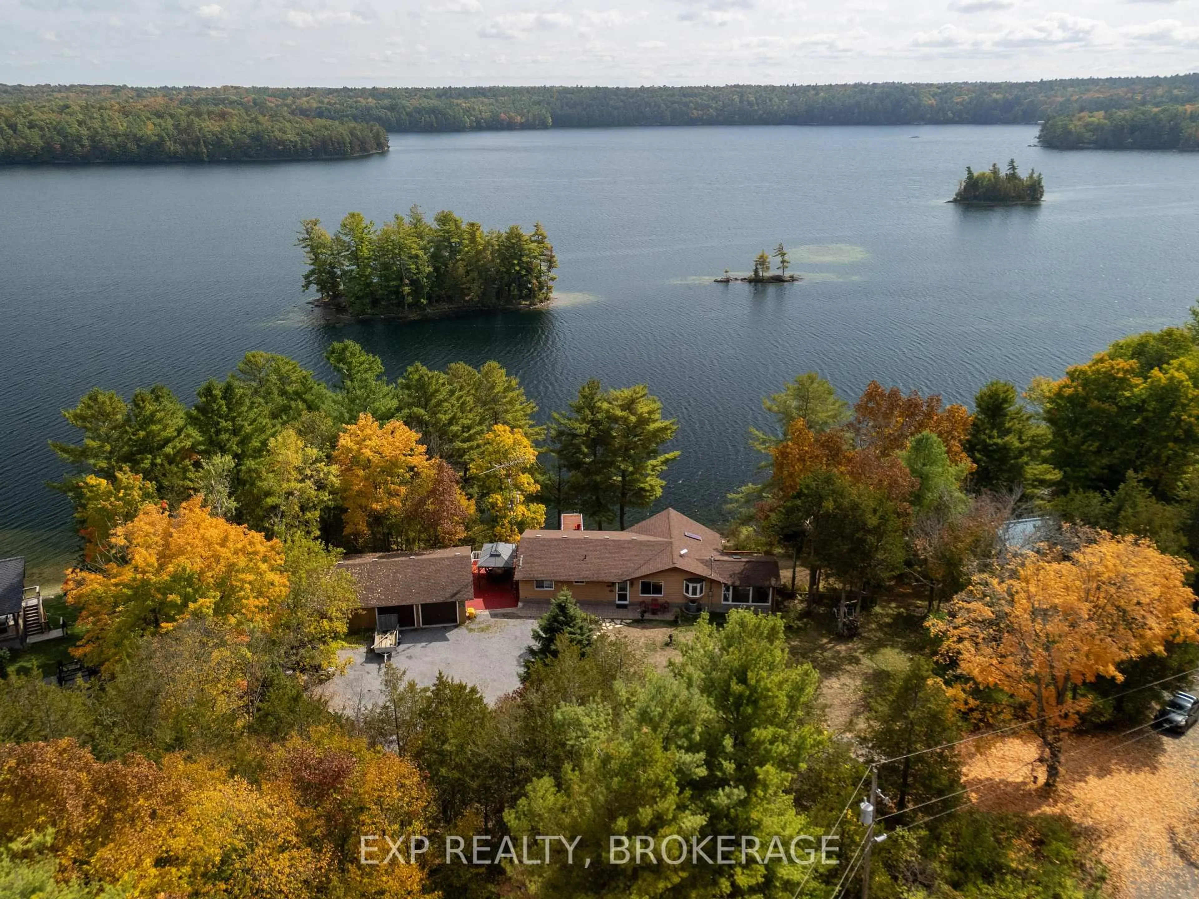 A pic from outside/outdoor area/front of a property/back of a property/a pic from drone, water/lake/river/ocean view for 3037 Hilltop Lane, Perth Road Ontario K0H 2L0