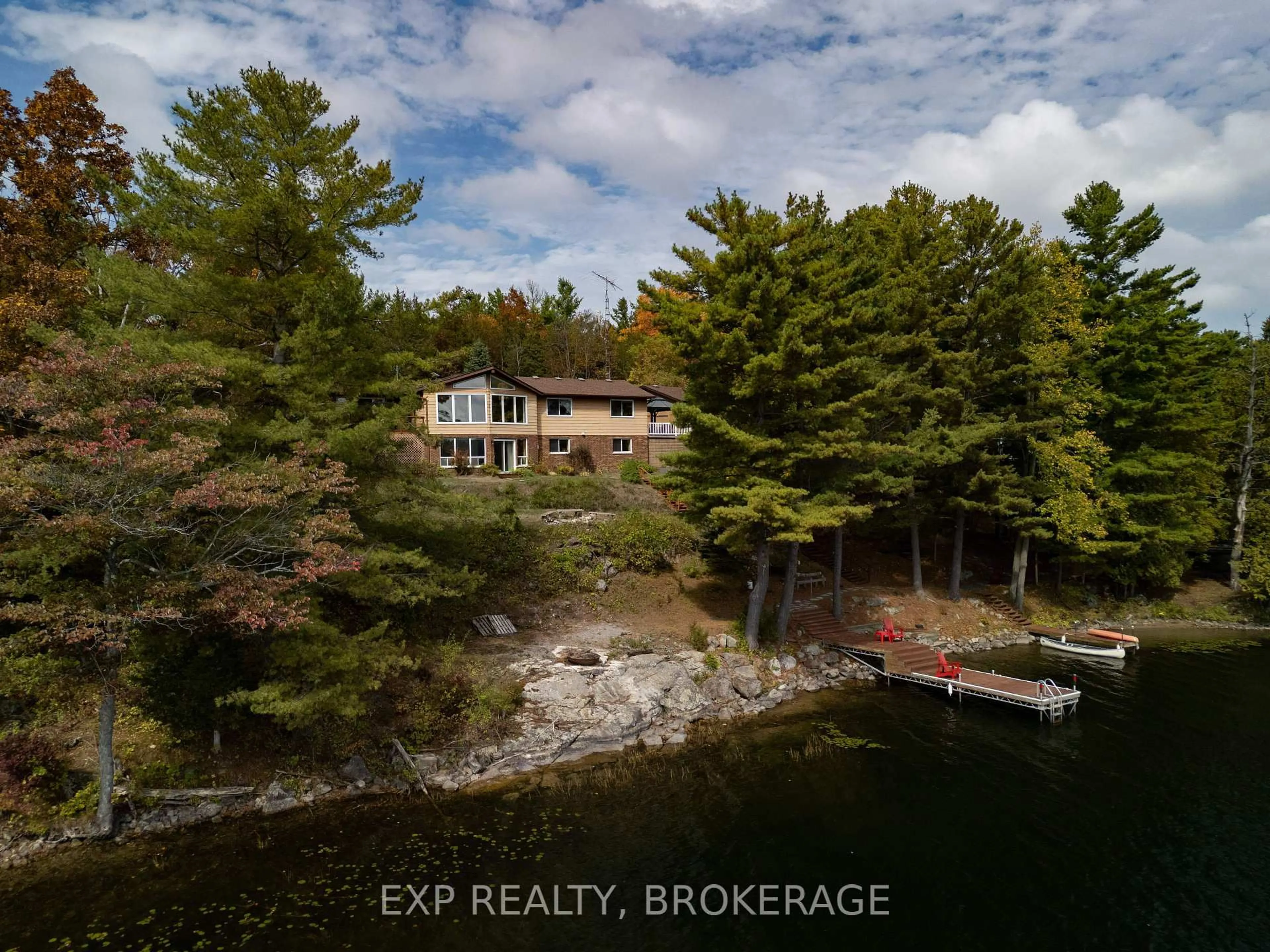 A pic from outside/outdoor area/front of a property/back of a property/a pic from drone, water/lake/river/ocean view for 3037 Hilltop Lane, Perth Road Ontario K0H 2L0