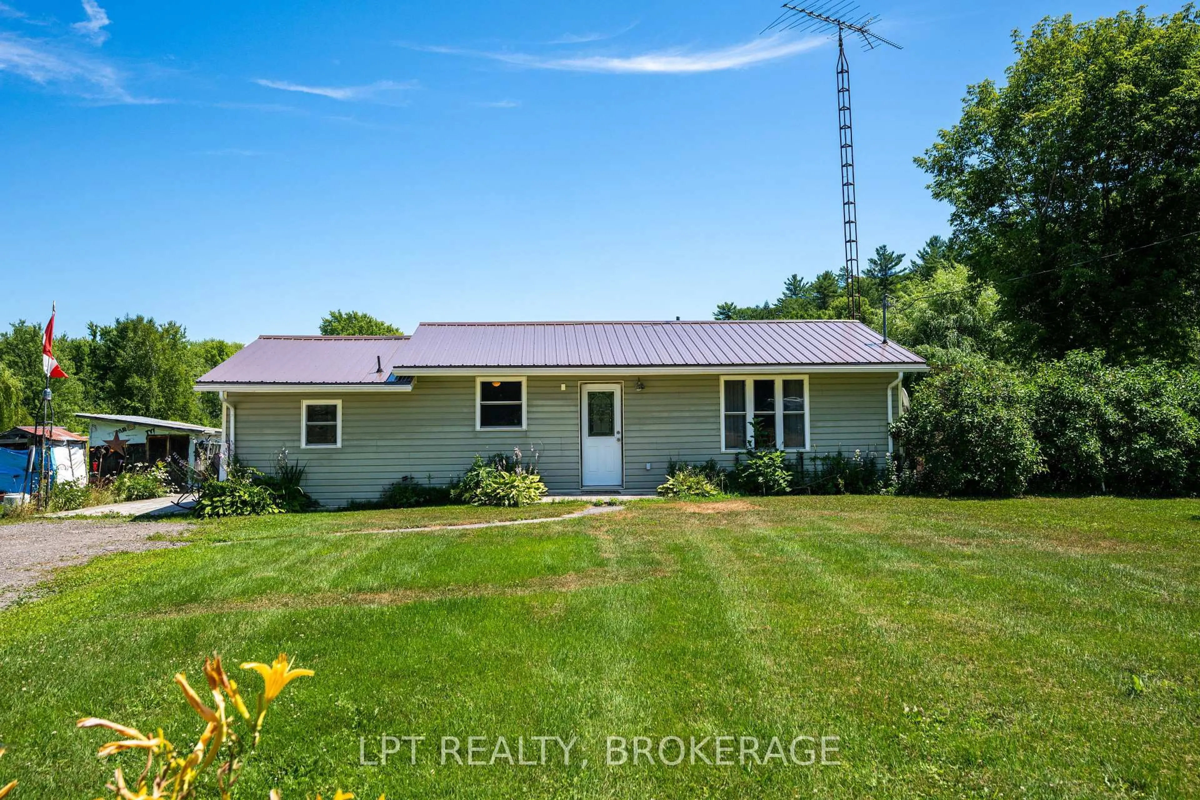 A pic from outside/outdoor area/front of a property/back of a property/a pic from drone, unknown for 743 Highway 15, Rr#2 Highway, Rideau Lakes Ontario K0E 1N0