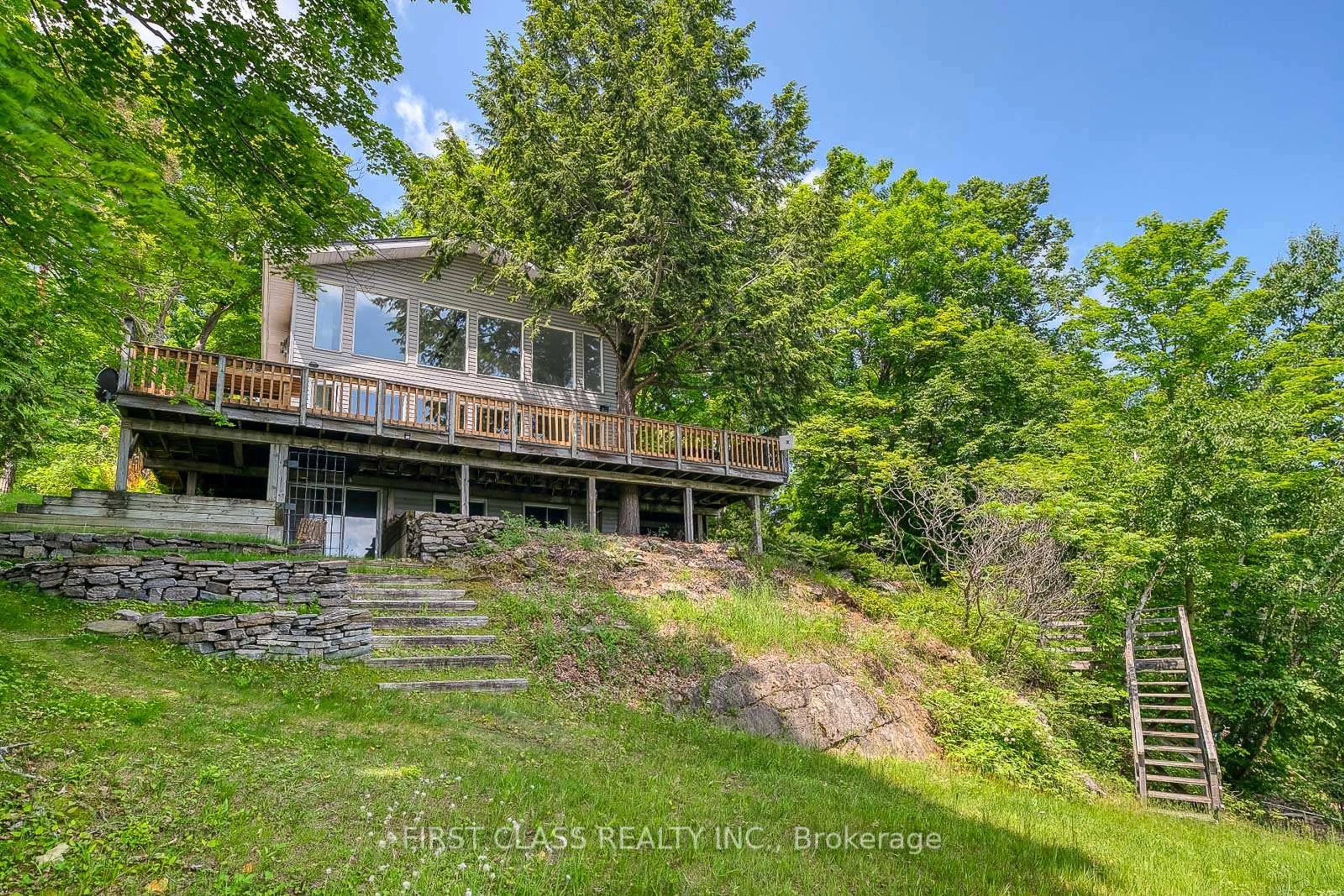 A pic from outside/outdoor area/front of a property/back of a property/a pic from drone, water/lake/river/ocean view for 312A Henry Lane, Godfrey Ontario K0H 1T0