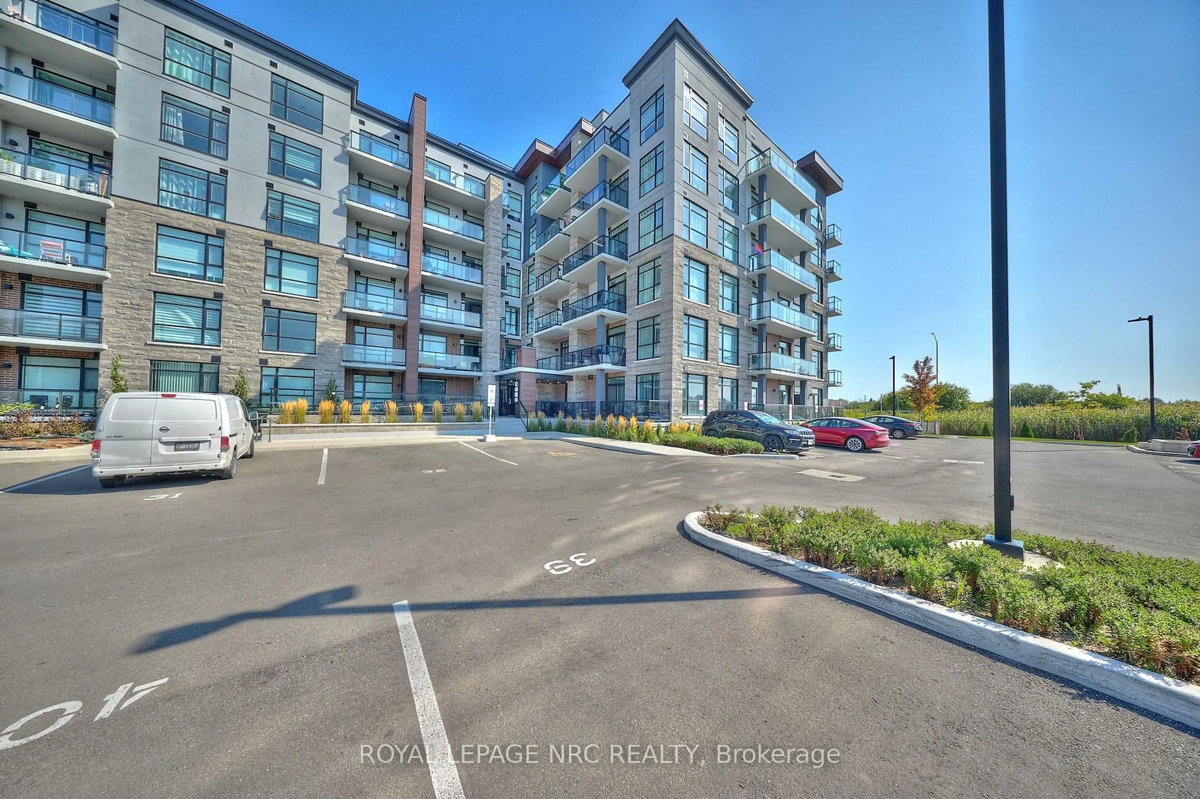 A pic from outside/outdoor area/front of a property/back of a property/a pic from drone, building for 600 North Service Rd #221, Hamilton Ontario L8E 0L2