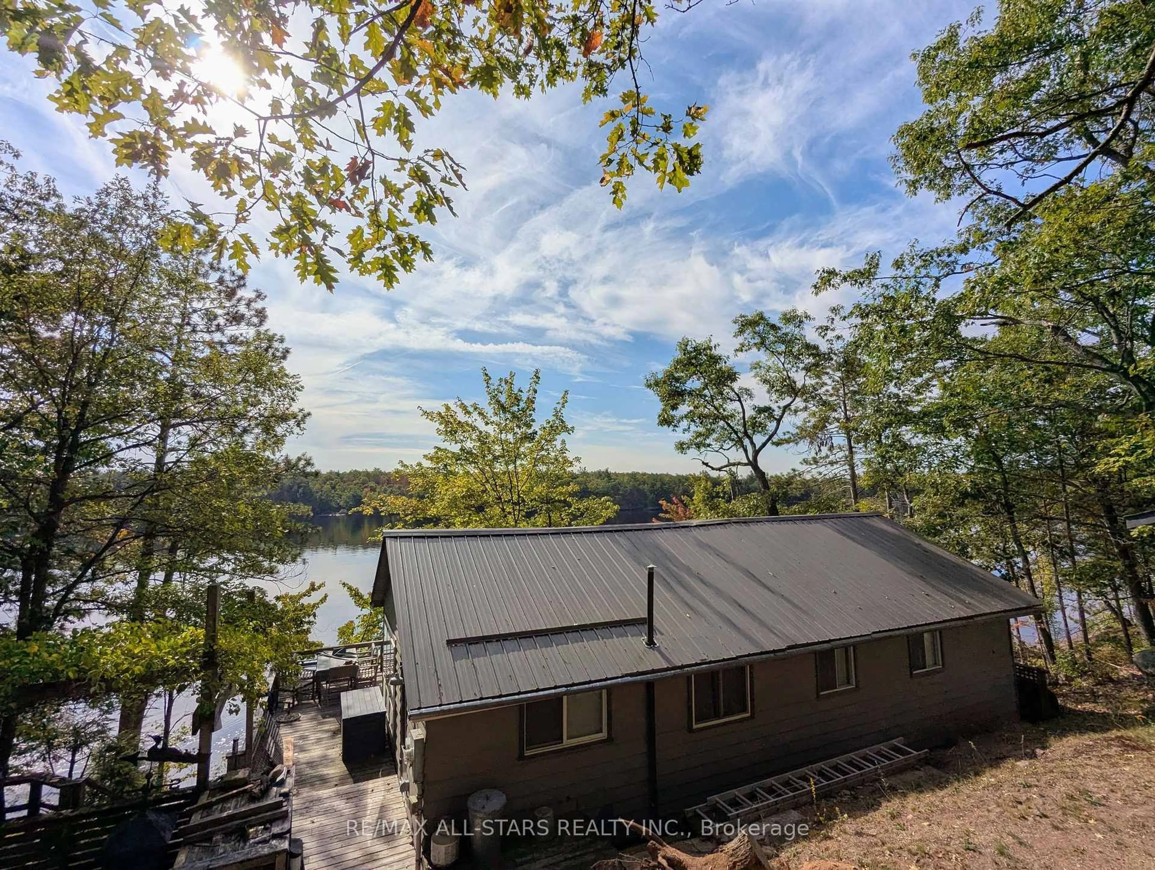 A pic from outside/outdoor area/front of a property/back of a property/a pic from drone, water/lake/river/ocean view for 754 Loucks Lake Wao, North Kawartha Ontario K0L 1A0