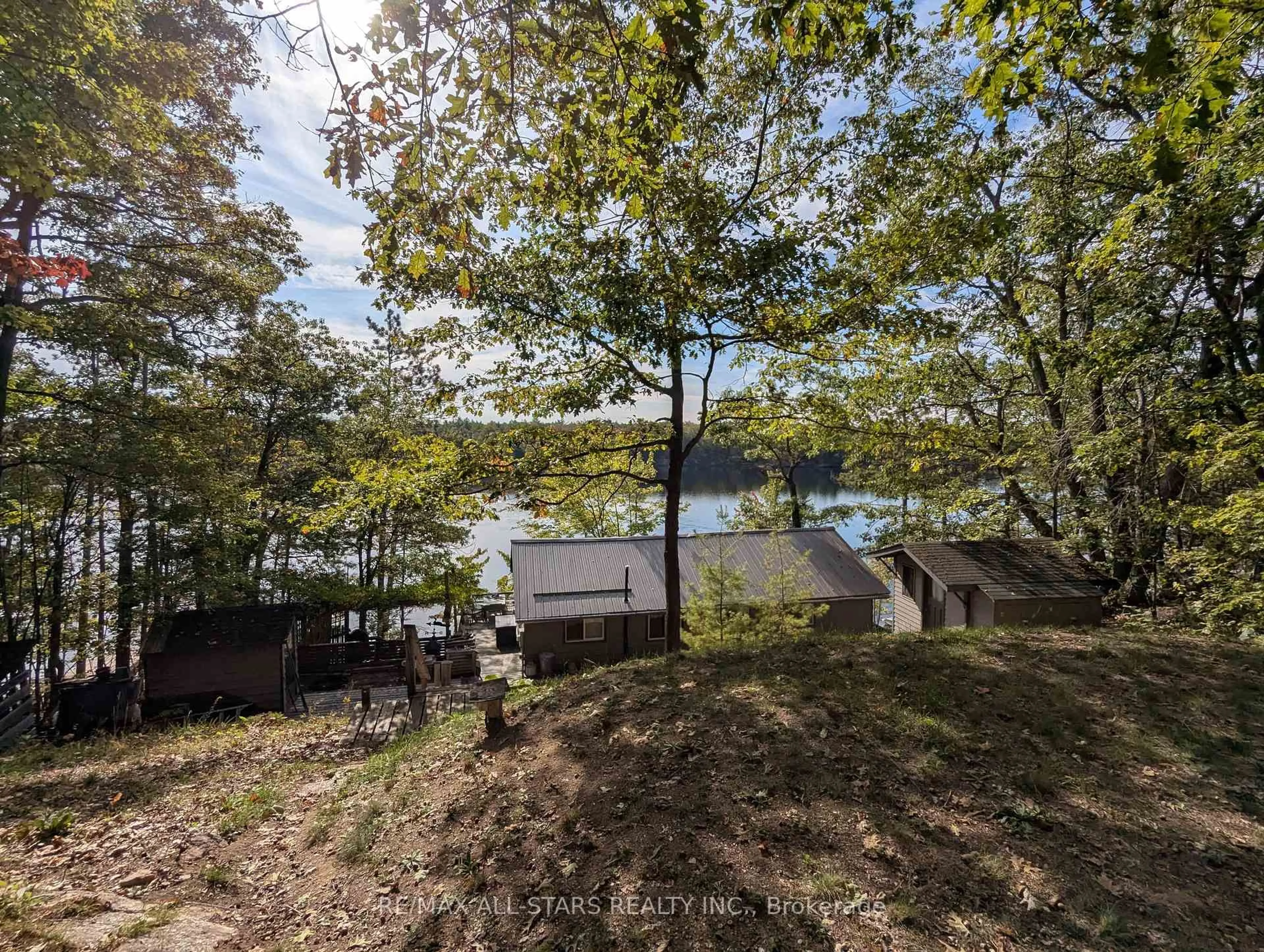 A pic from outside/outdoor area/front of a property/back of a property/a pic from drone, water/lake/river/ocean view for 754 Loucks Lake Wao, North Kawartha Ontario K0L 1A0