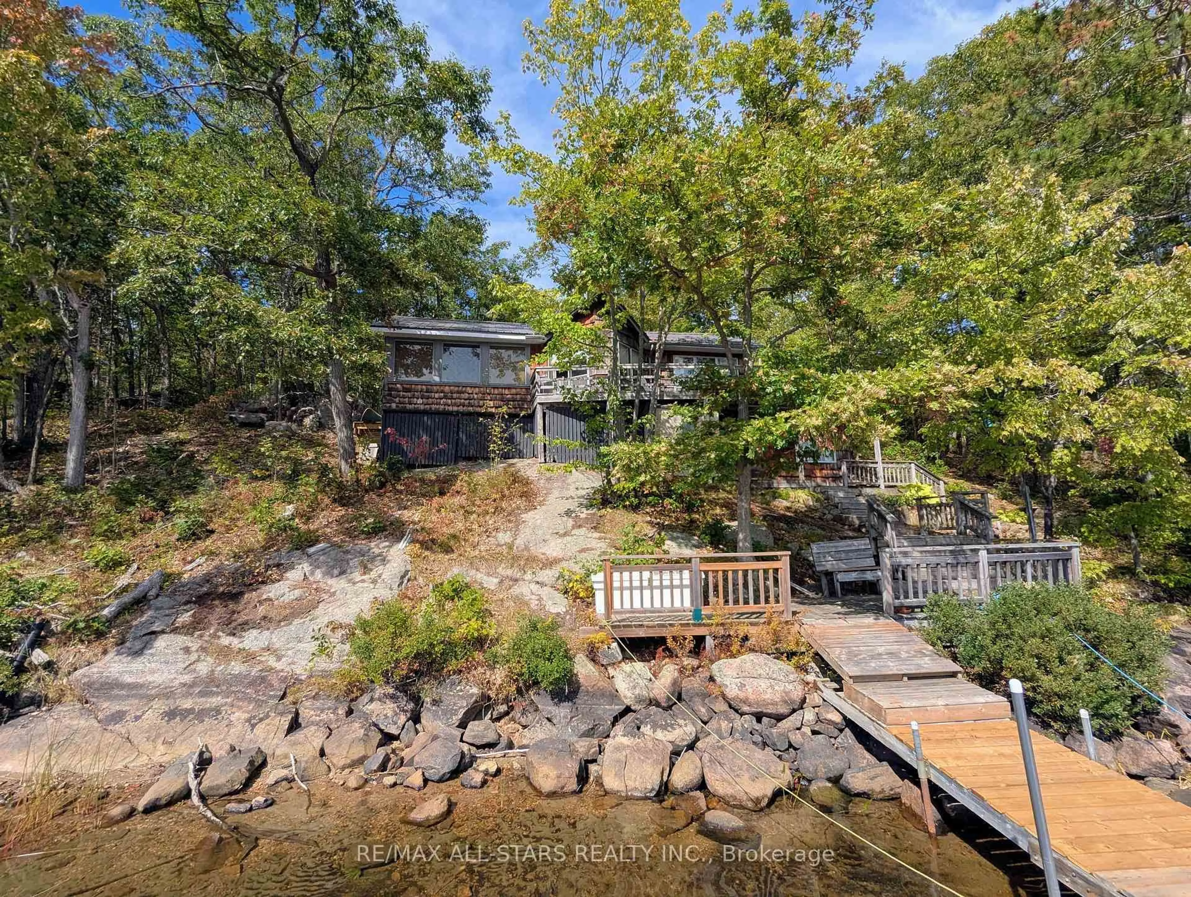A pic from outside/outdoor area/front of a property/back of a property/a pic from drone, water/lake/river/ocean view for 754 Loucks Lake Wao, North Kawartha Ontario K0L 1A0