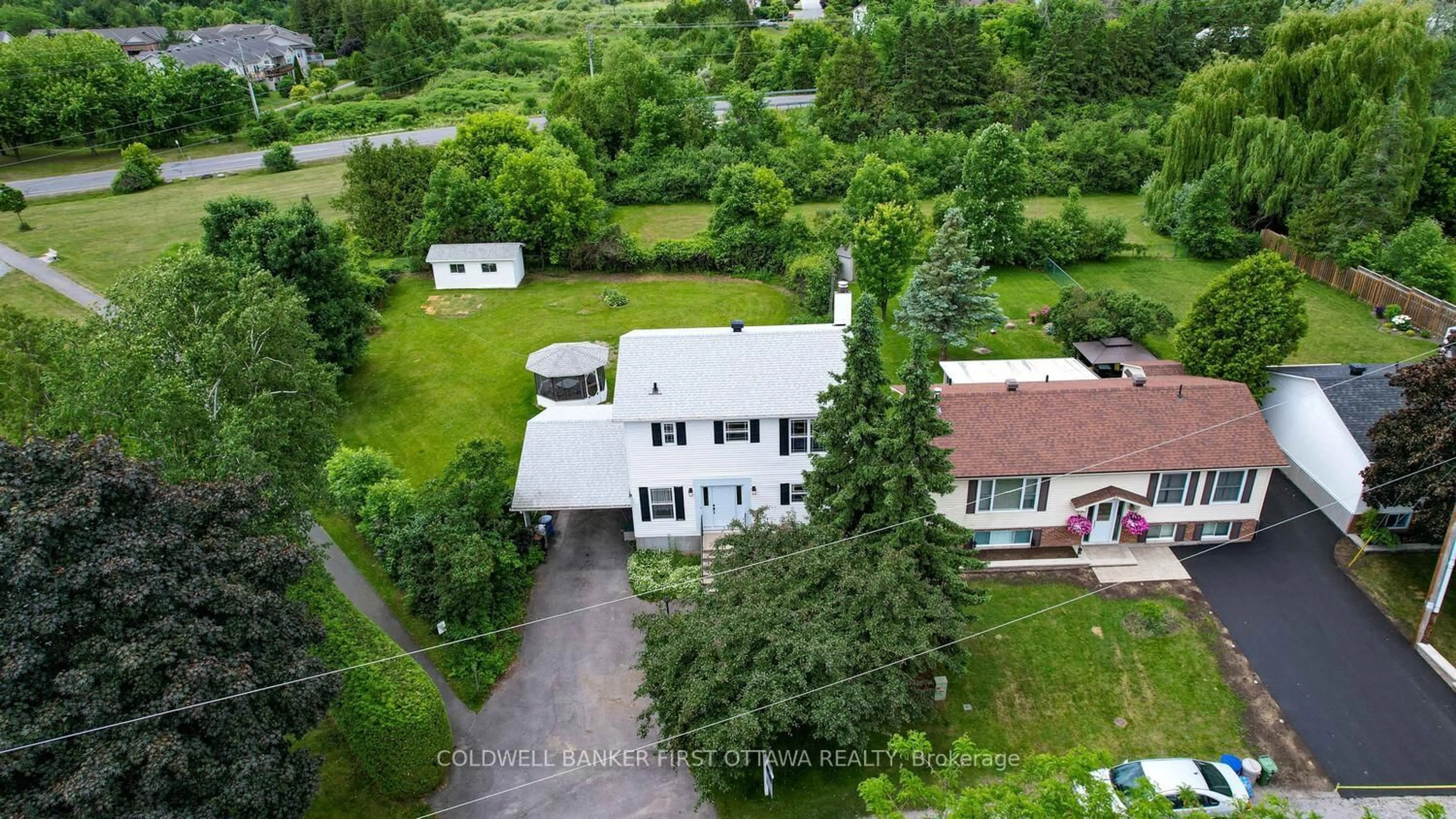 A pic from outside/outdoor area/front of a property/back of a property/a pic from drone, unknown for 22 Poole Creek Cres, Stittsville Ontario K2S 1G4