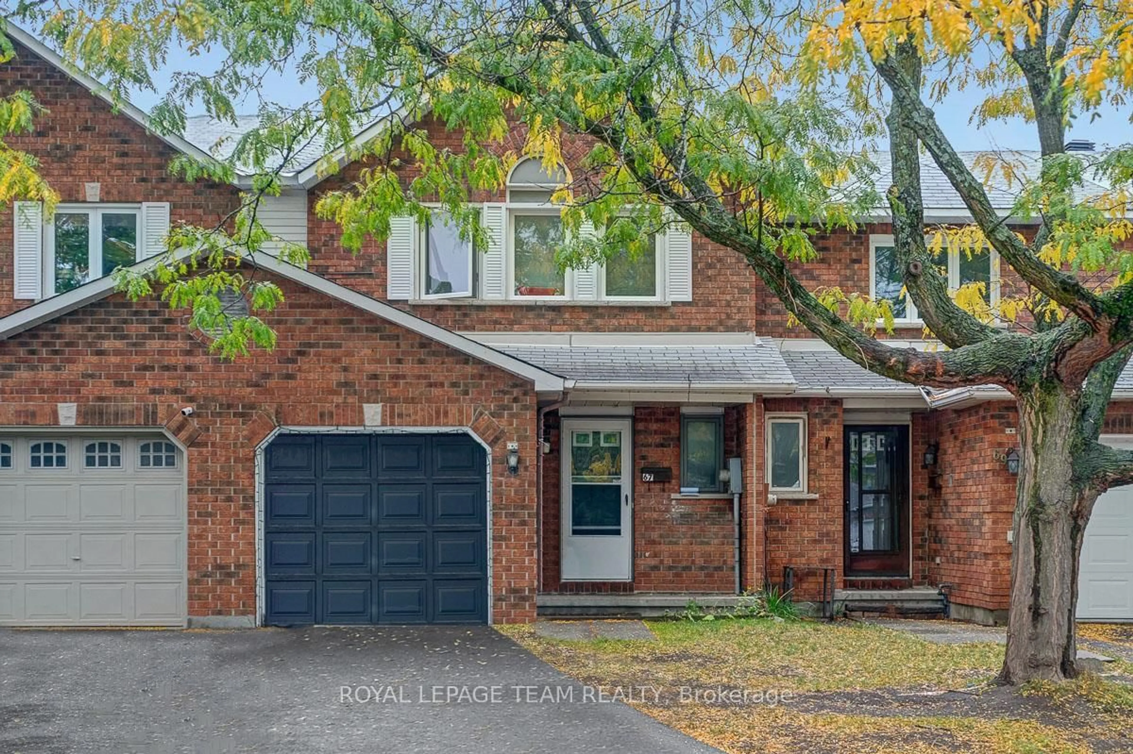Home with brick exterior material, street for 67 Peterson Pl, Ottawa Ontario K2L 4A8