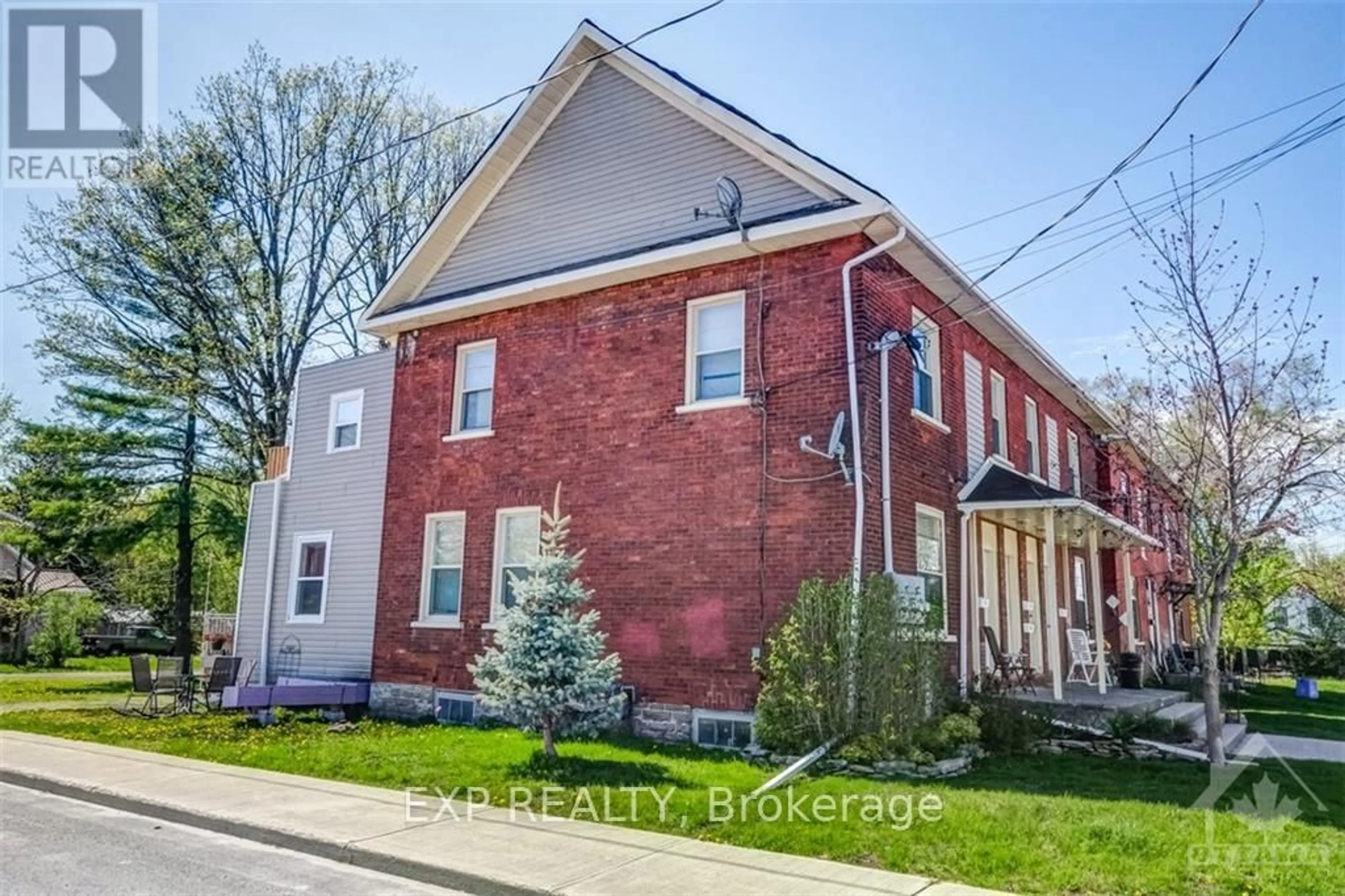Home with brick exterior material, street for 70-72 Victoria Ave, Smiths Falls Ontario K7A 2P5