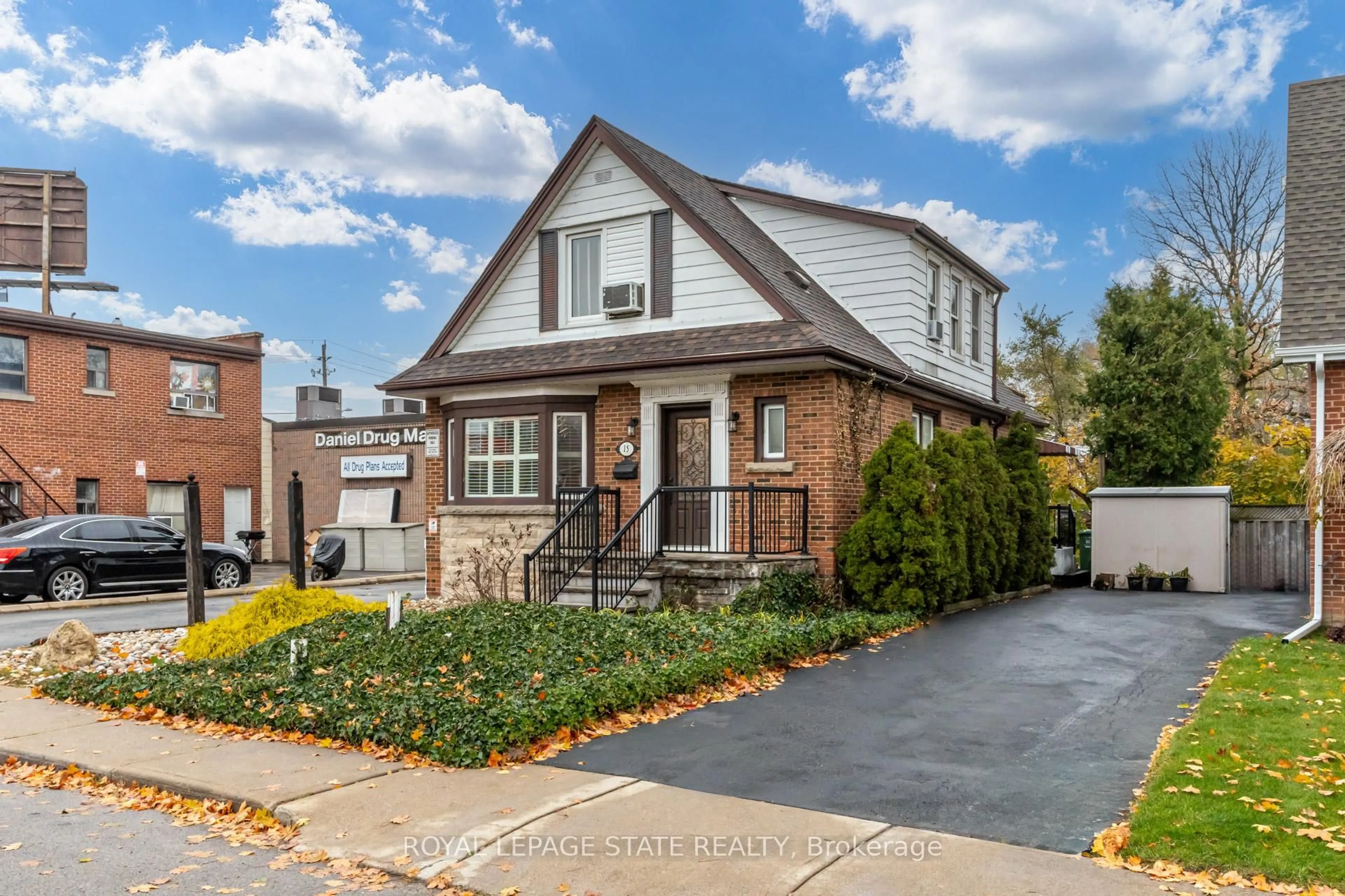 Home with brick exterior material, street for 15 Empress Ave, Hamilton Ontario L9A 1M1