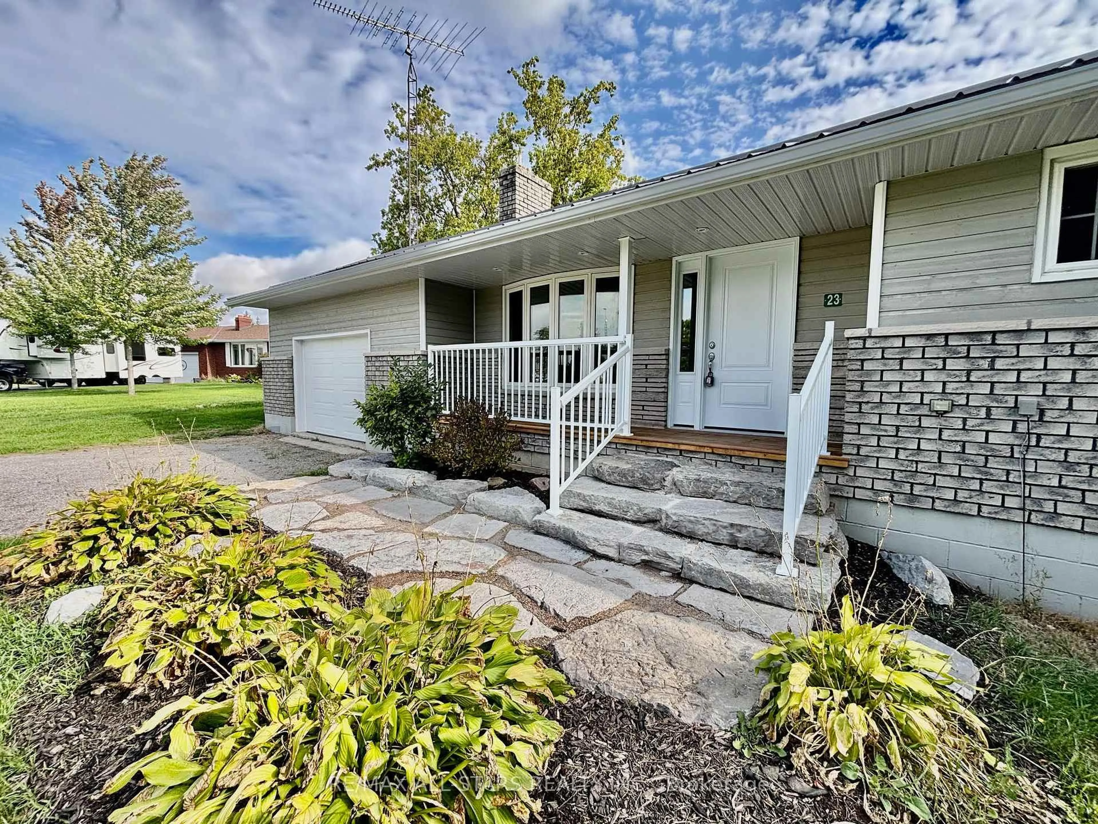 Home with vinyl exterior material, street for 23 Bruce St, Kawartha Lakes Ontario K0M 2M0