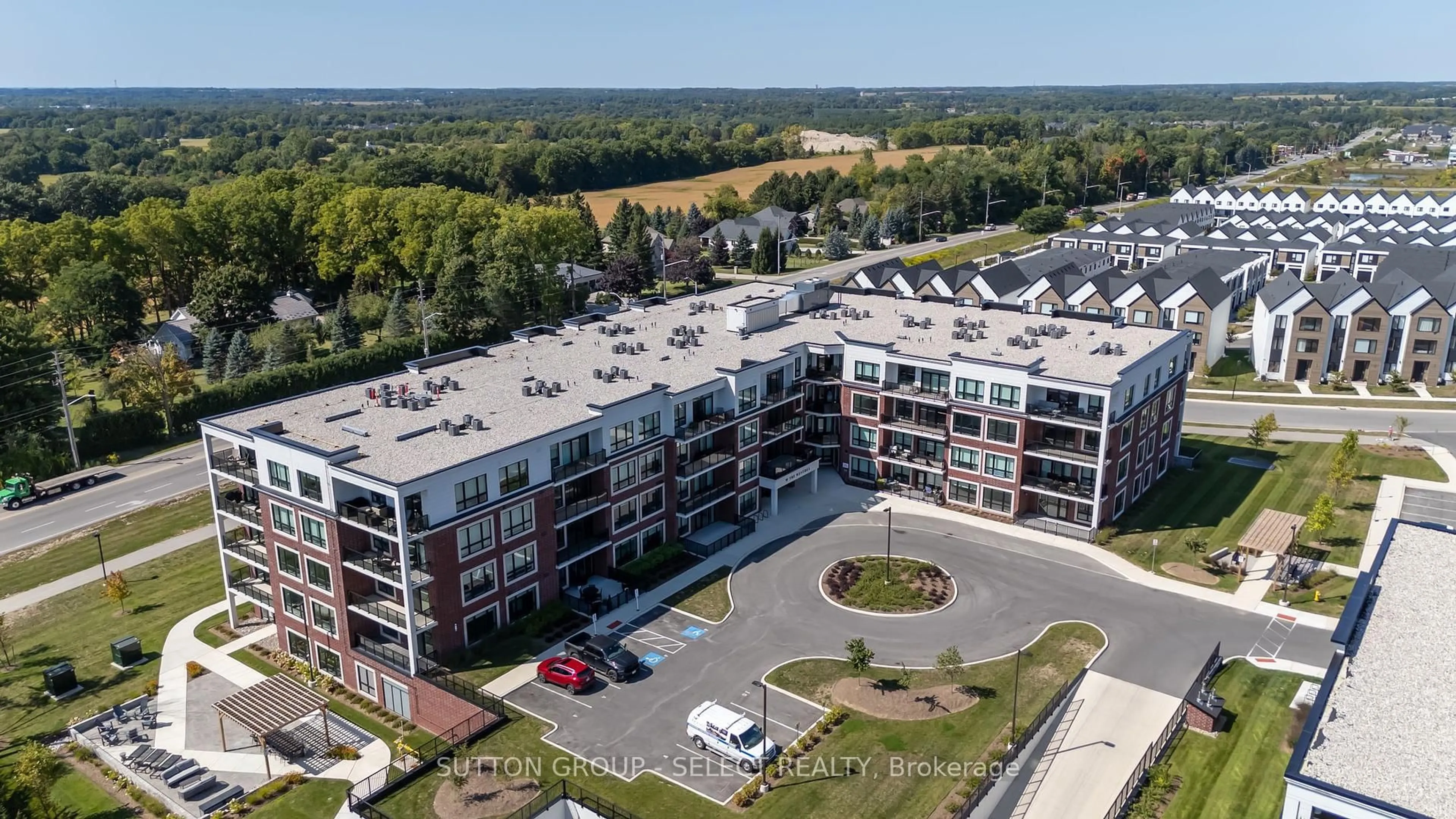 A pic from outside/outdoor area/front of a property/back of a property/a pic from drone, unknown for 1975 Fountain Grass Dr #307, London South Ontario N6K 0M3