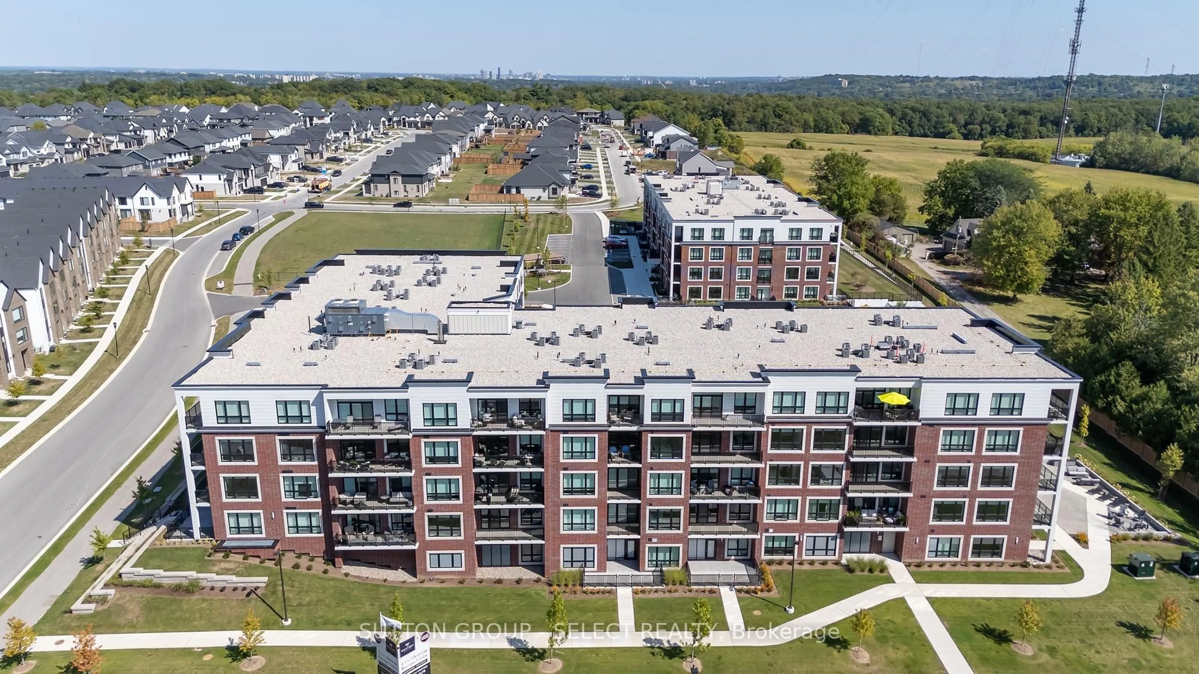 A pic from outside/outdoor area/front of a property/back of a property/a pic from drone, unknown for 1975 Fountain Grass Dr #307, London South Ontario N6K 0M3