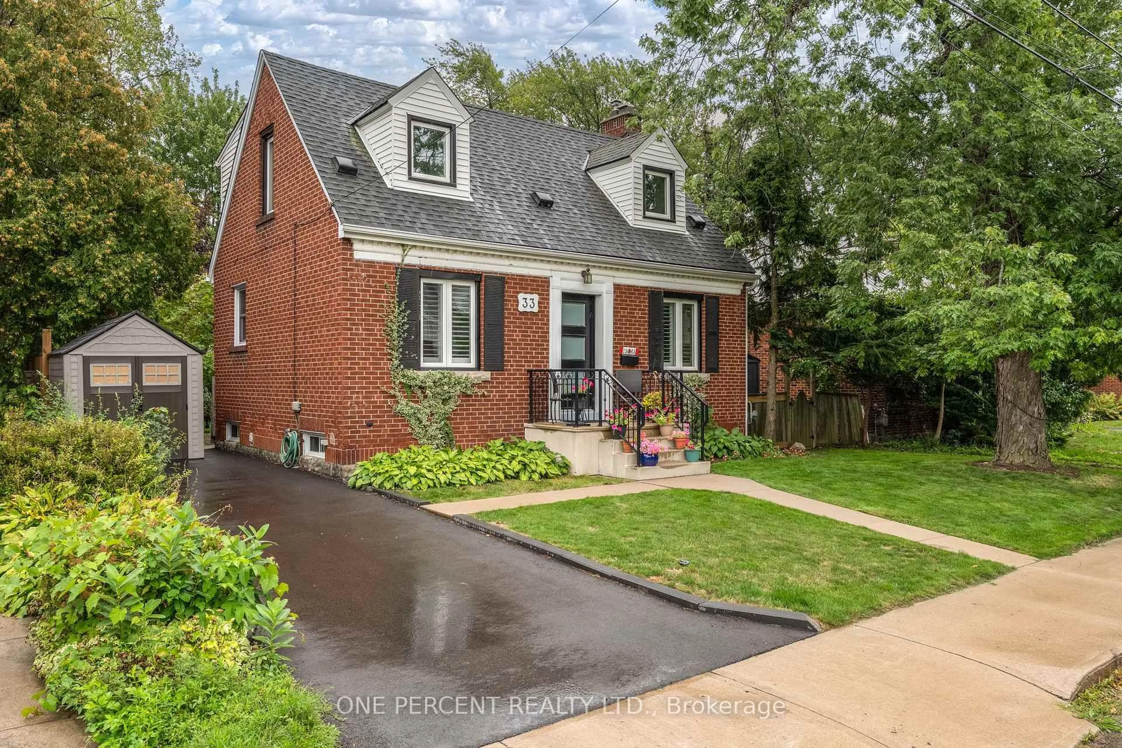 Home with brick exterior material, street for 33 East 12th St, Hamilton Ontario L9A 3X2