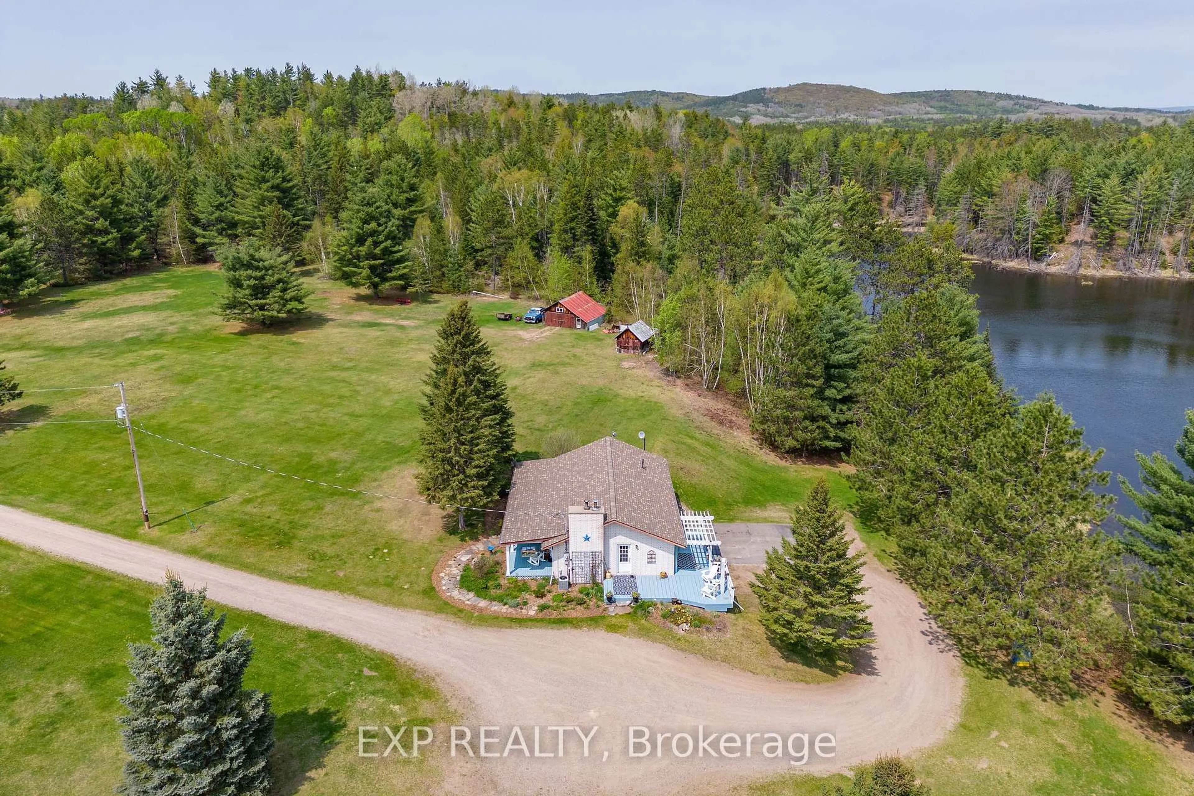 A pic from outside/outdoor area/front of a property/back of a property/a pic from drone, water/lake/river/ocean view for 11462 Opeongo Rd, Barry's Bay Ontario K0J 1B0