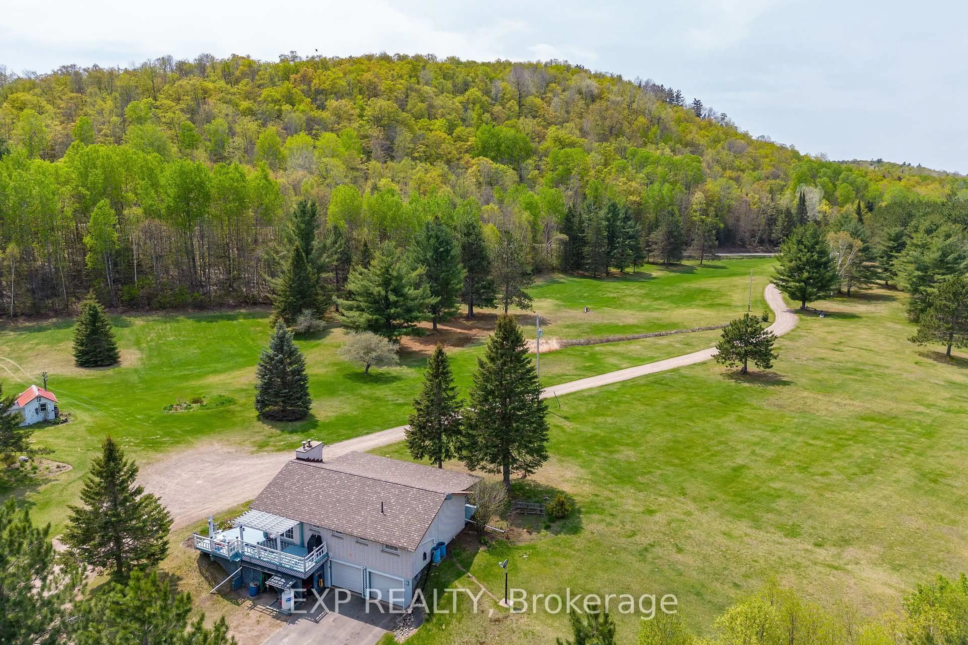 A pic from outside/outdoor area/front of a property/back of a property/a pic from drone, forest/trees view for 11462 Opeongo Rd, Barry's Bay Ontario K0J 1B0
