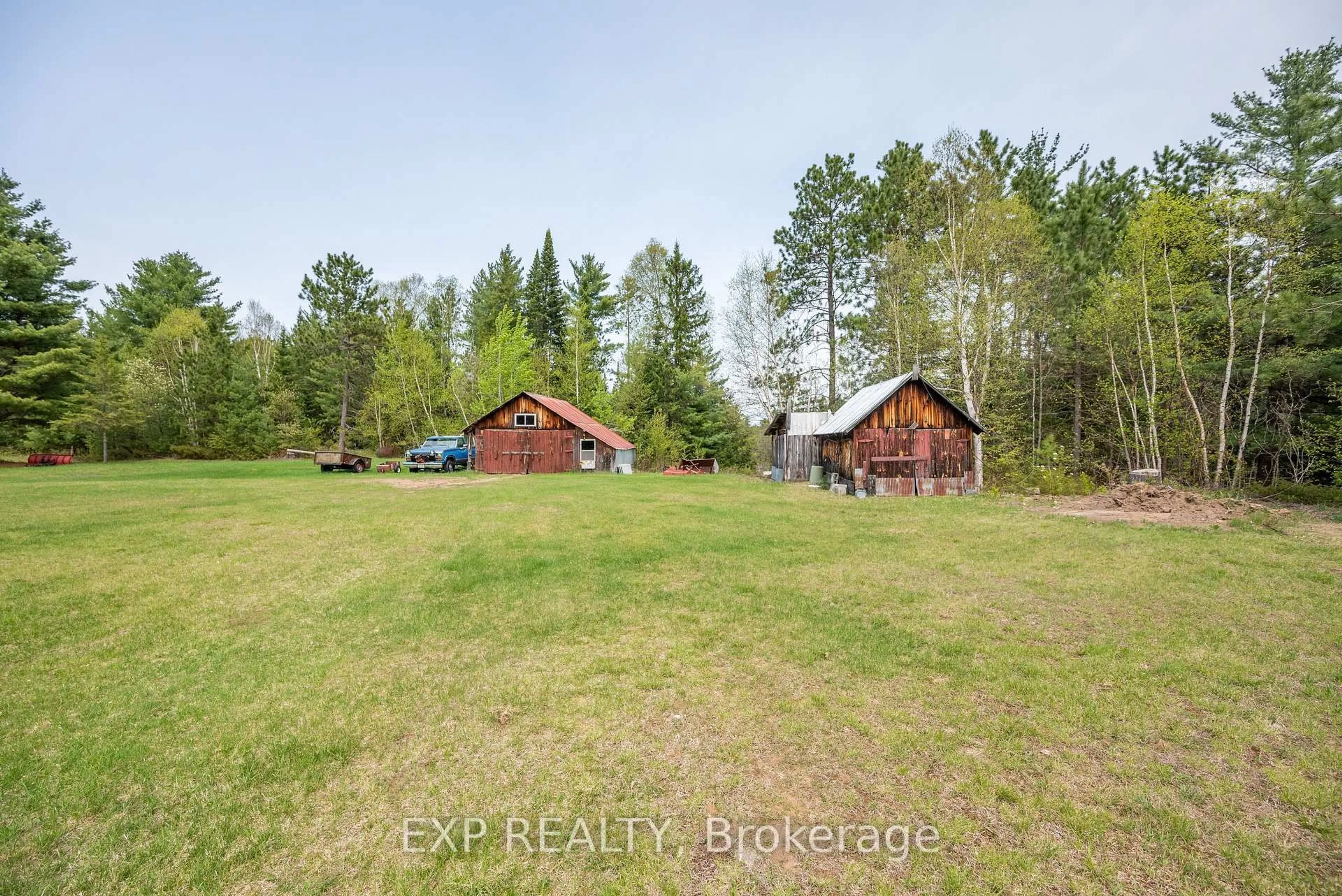 A pic from outside/outdoor area/front of a property/back of a property/a pic from drone, forest/trees view for 11462 Opeongo Rd, Barry's Bay Ontario K0J 1B0