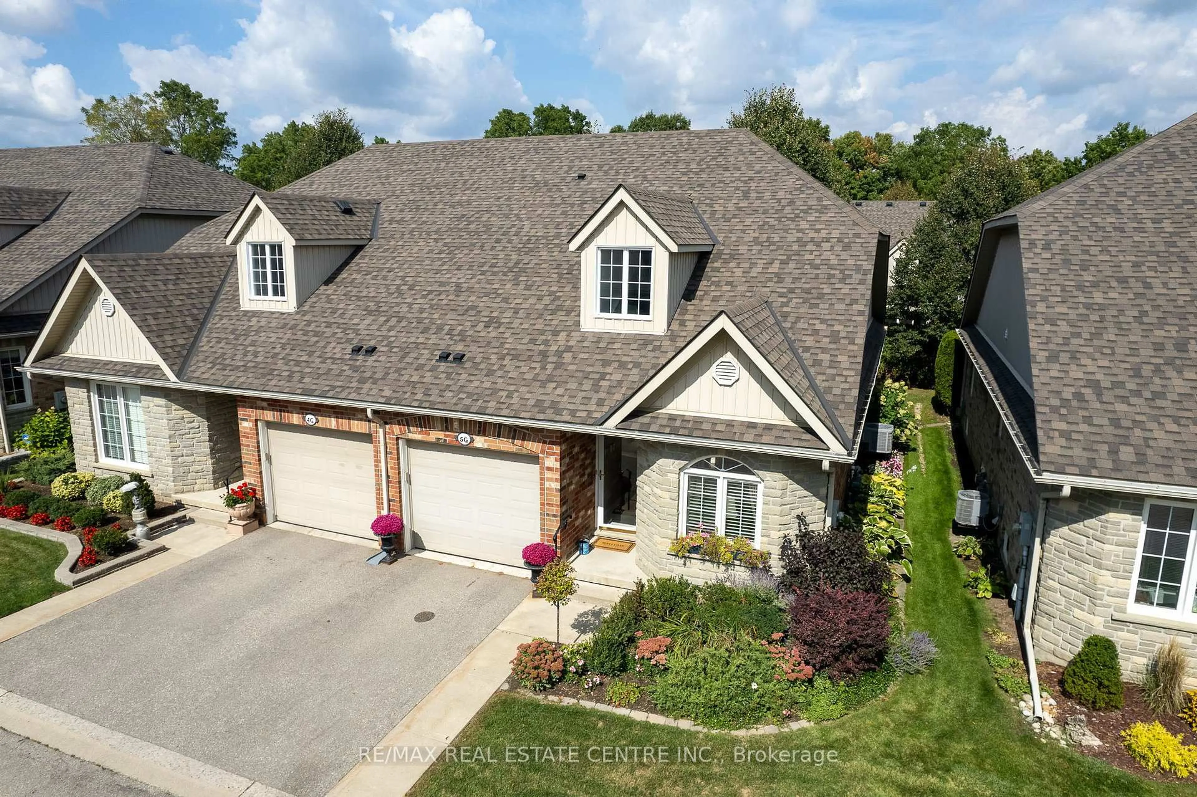 A pic from outside/outdoor area/front of a property/back of a property/a pic from drone, street for 350 Doon Valley Dr #5G, Kitchener Ontario N2P 2M9