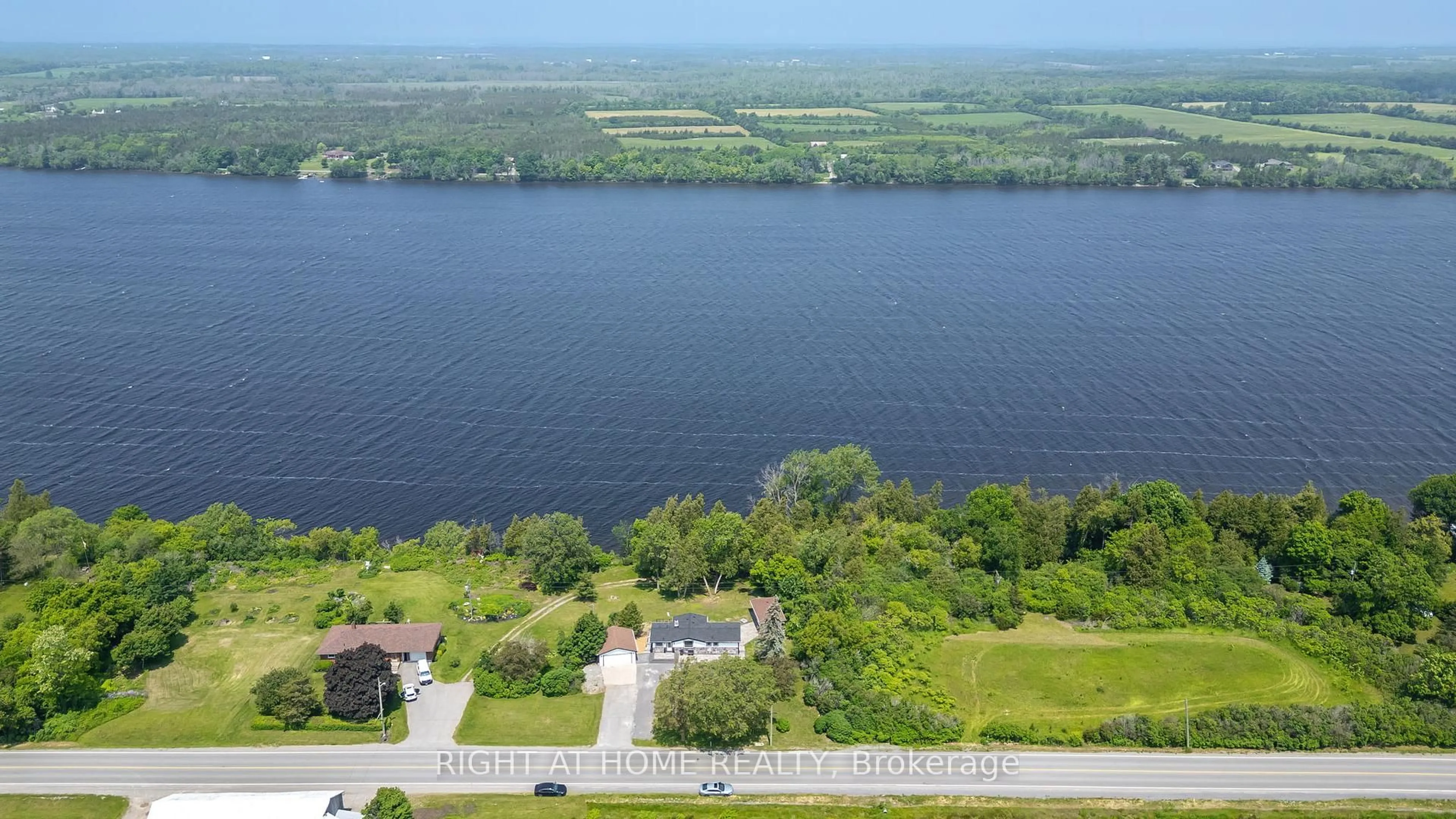 A pic from outside/outdoor area/front of a property/back of a property/a pic from drone, water/lake/river/ocean view for 4670 COUNTY ROAD 1 Rd, Prince Edward County Ontario K0K 1T0