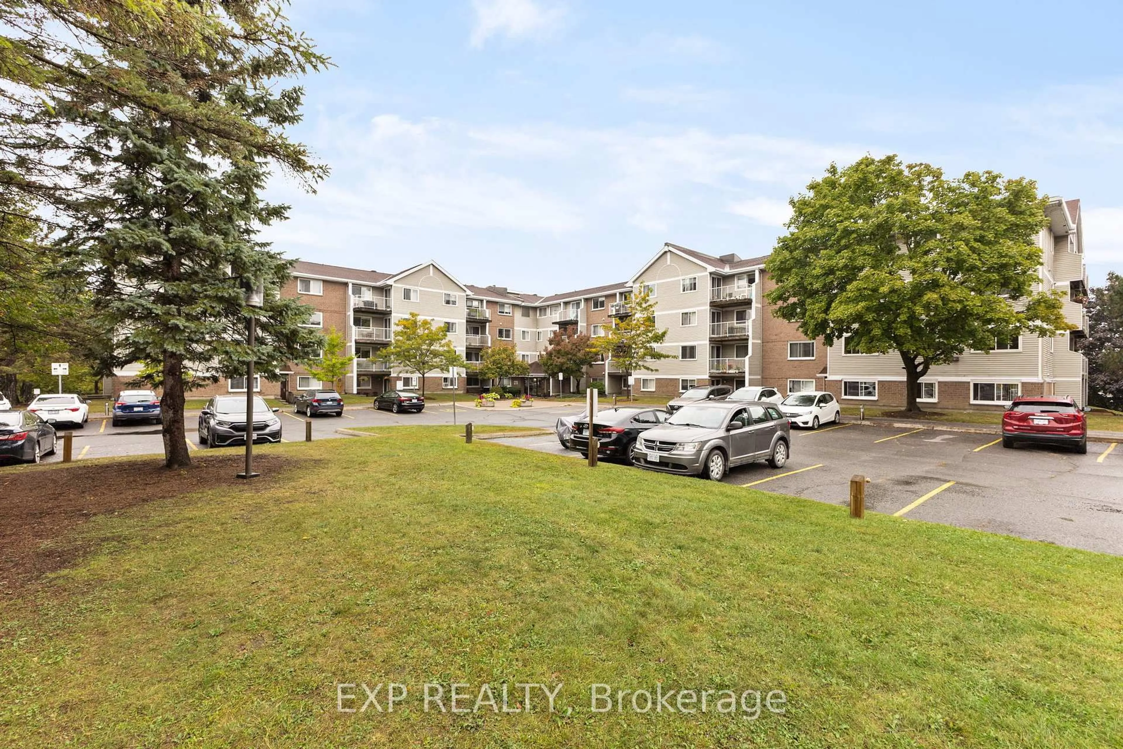 A pic from outside/outdoor area/front of a property/back of a property/a pic from drone, street for 270 Brittany Dr #304, Ottawa Ontario K1K 4M3