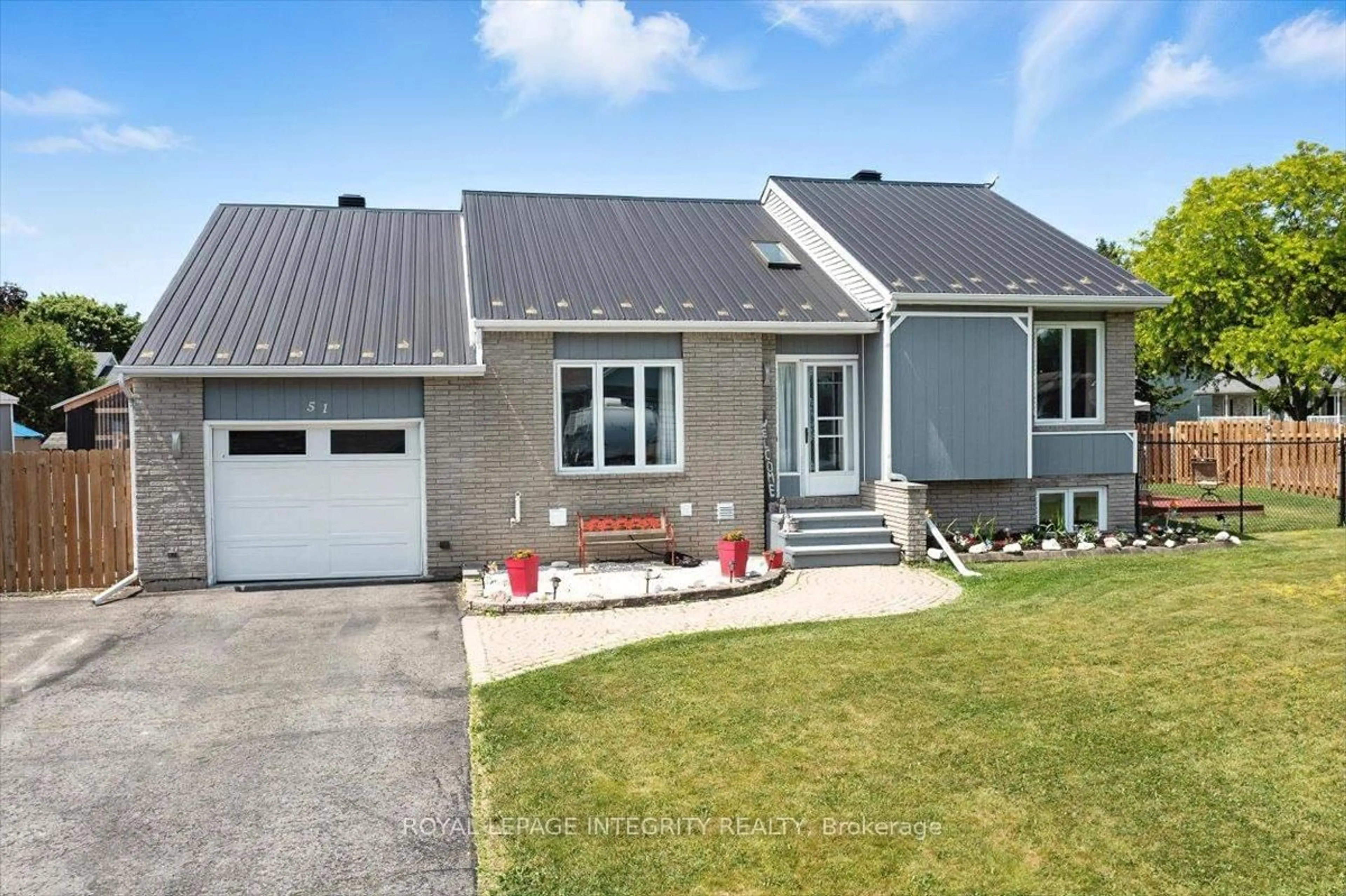 Home with vinyl exterior material, street for 51 Marcel St, Russell Ontario K0A 1W0