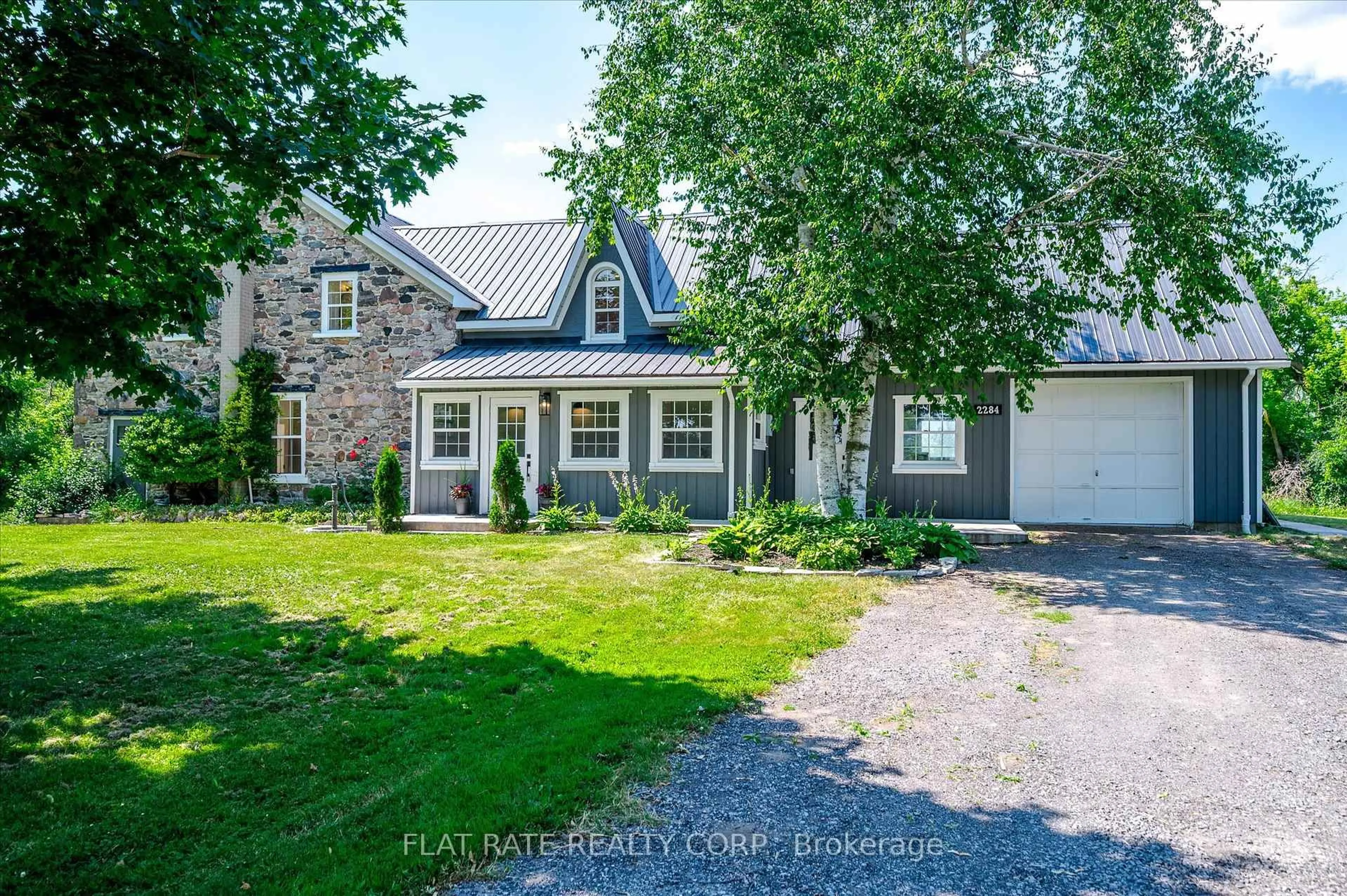 A pic from outside/outdoor area/front of a property/back of a property/a pic from drone, street for 2284 LANCASTER Rd, Otonabee-South Monaghan Ontario K9J 6X7