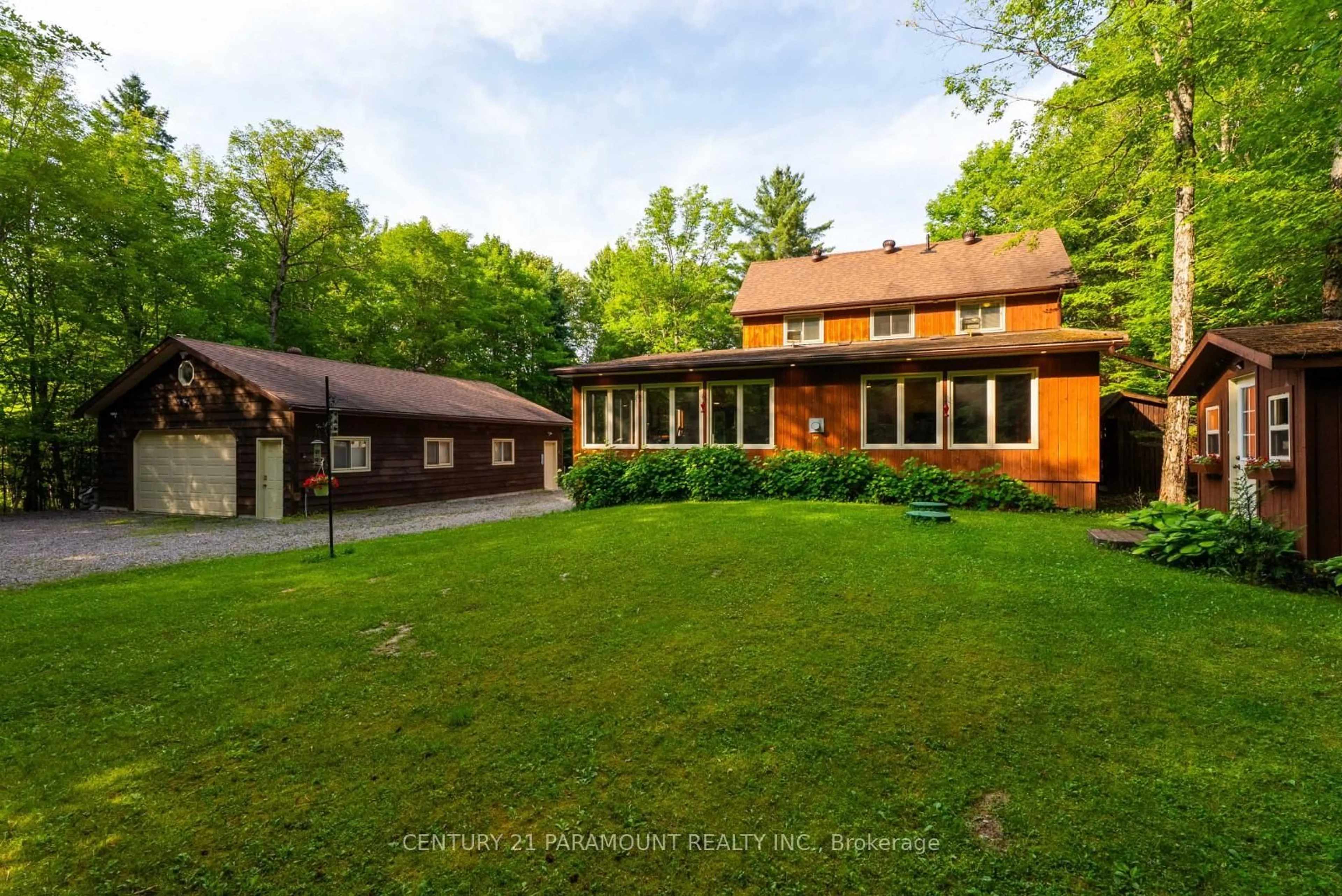 A pic from outside/outdoor area/front of a property/back of a property/a pic from drone, street for 775 ROSSKOPF ROAD, Magnetawan Ontario P0A 1C0
