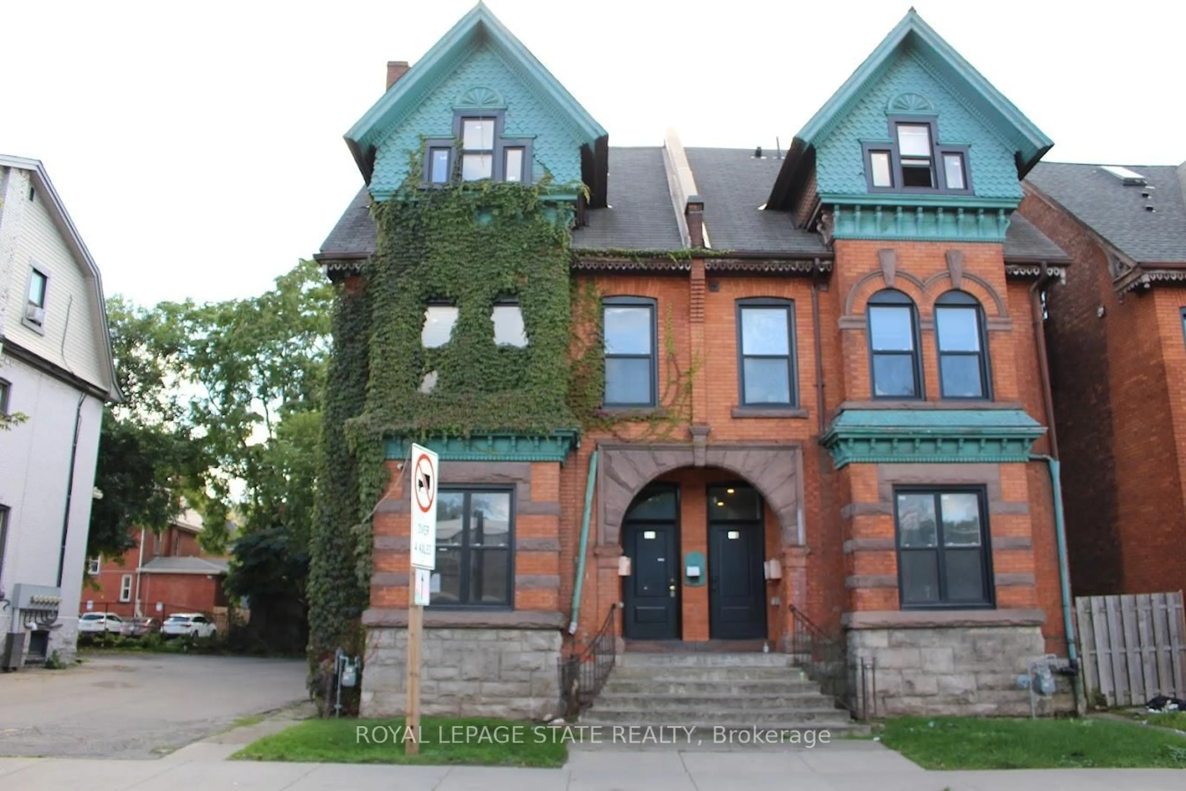 Home with brick exterior material, building for 500 Main St #E, Hamilton Ontario L8N 1K7