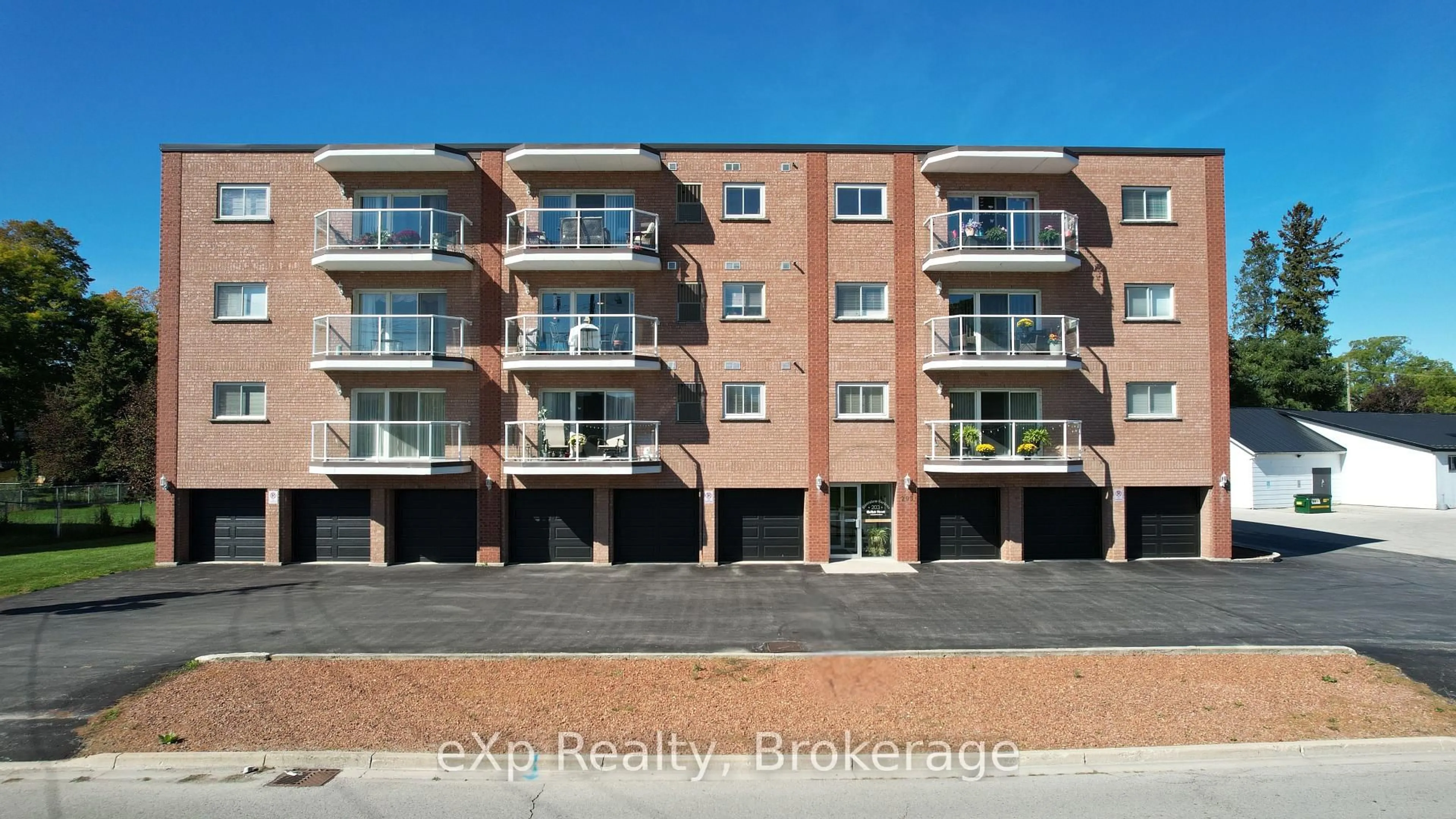 A pic from outside/outdoor area/front of a property/back of a property/a pic from drone, street for 203 McNab St #405, Brockton Ontario N0G 2V0