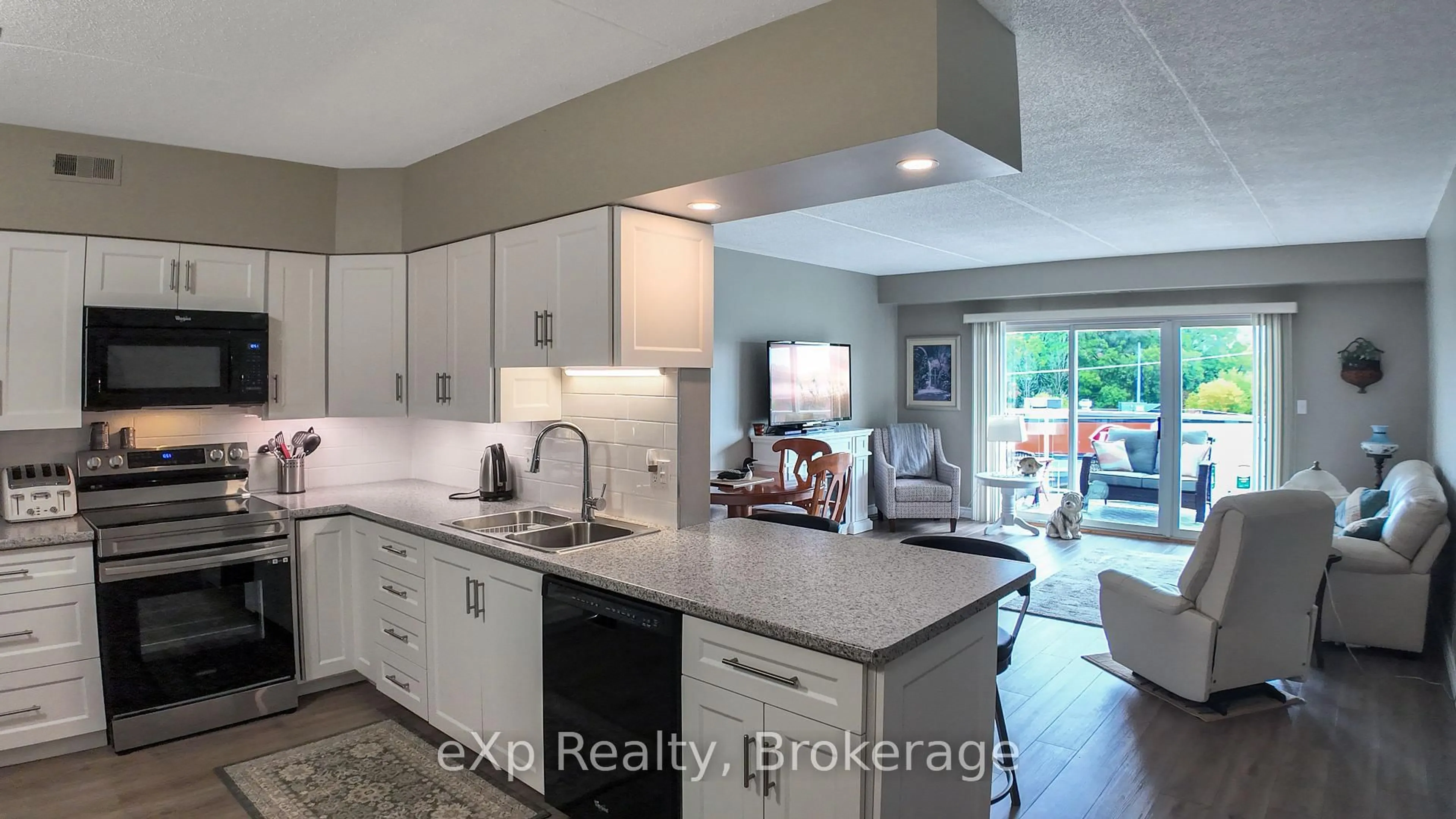 Open concept kitchen, ceramic/tile floor for 203 McNab St #405, Brockton Ontario N0G 2V0