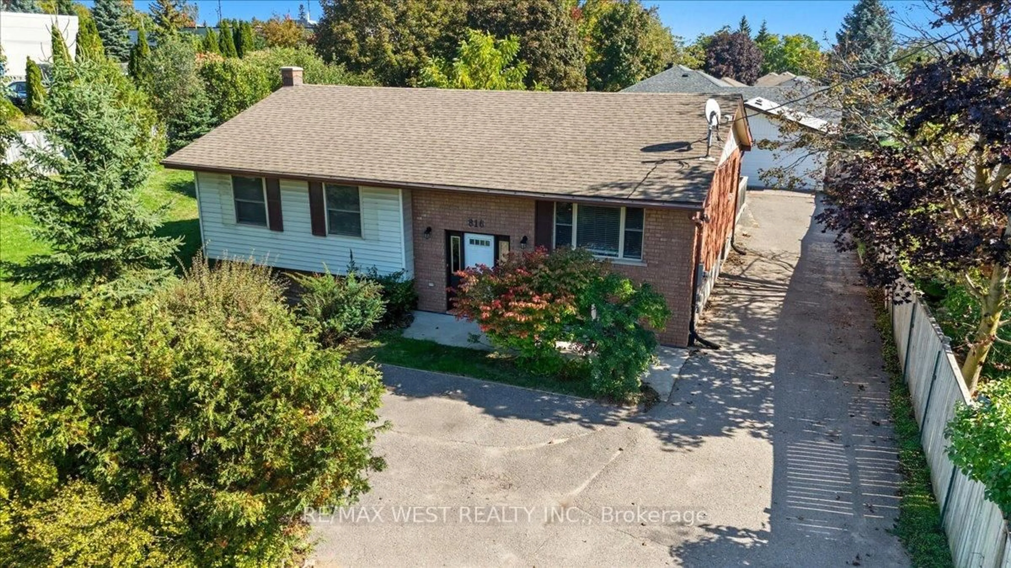 A pic from outside/outdoor area/front of a property/back of a property/a pic from drone, street for 816 Brealey Dr, Peterborough Ontario K9K 2M8