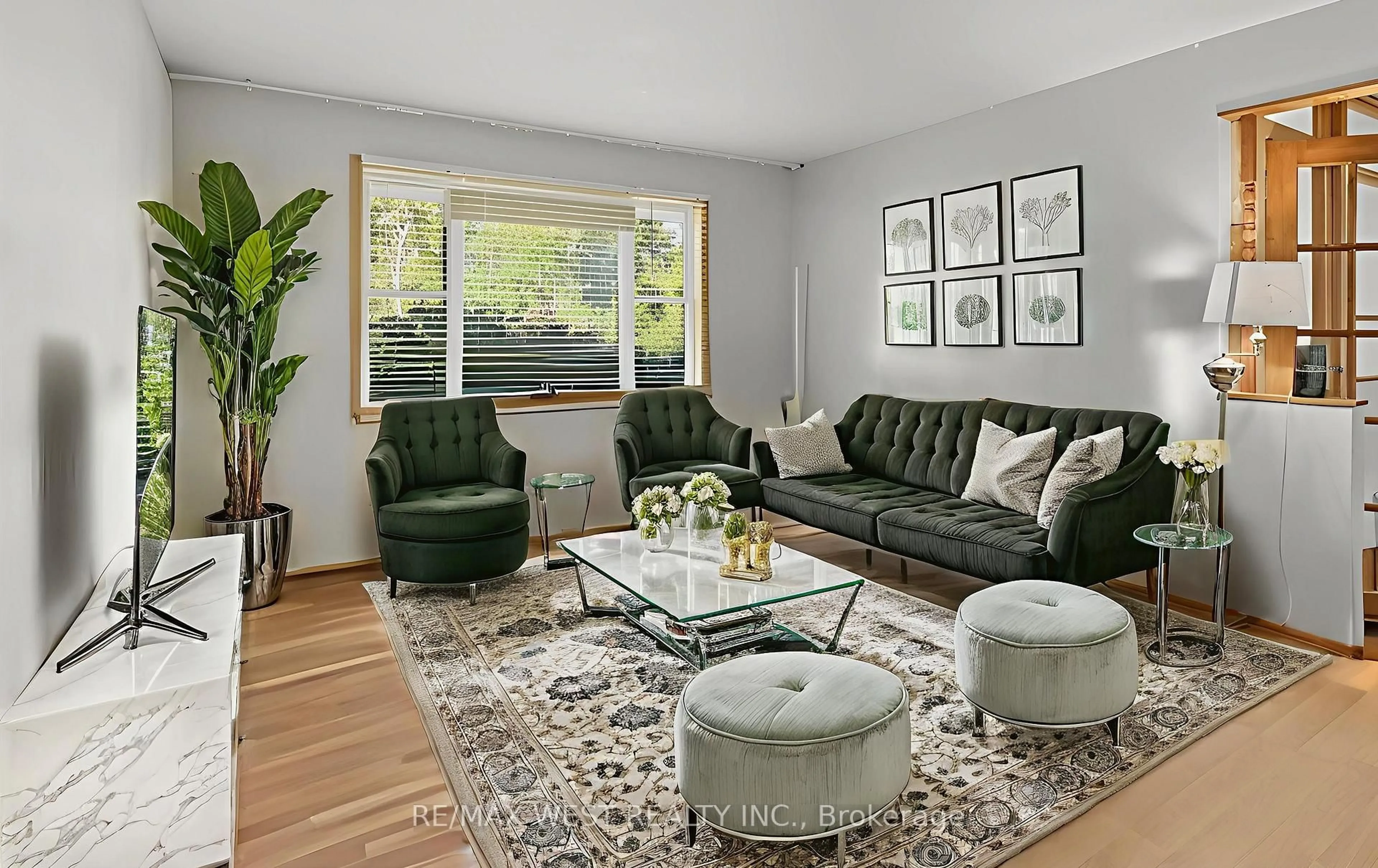 Living room with furniture, wood/laminate floor for 816 Brealey Dr, Peterborough Ontario K9K 2M8