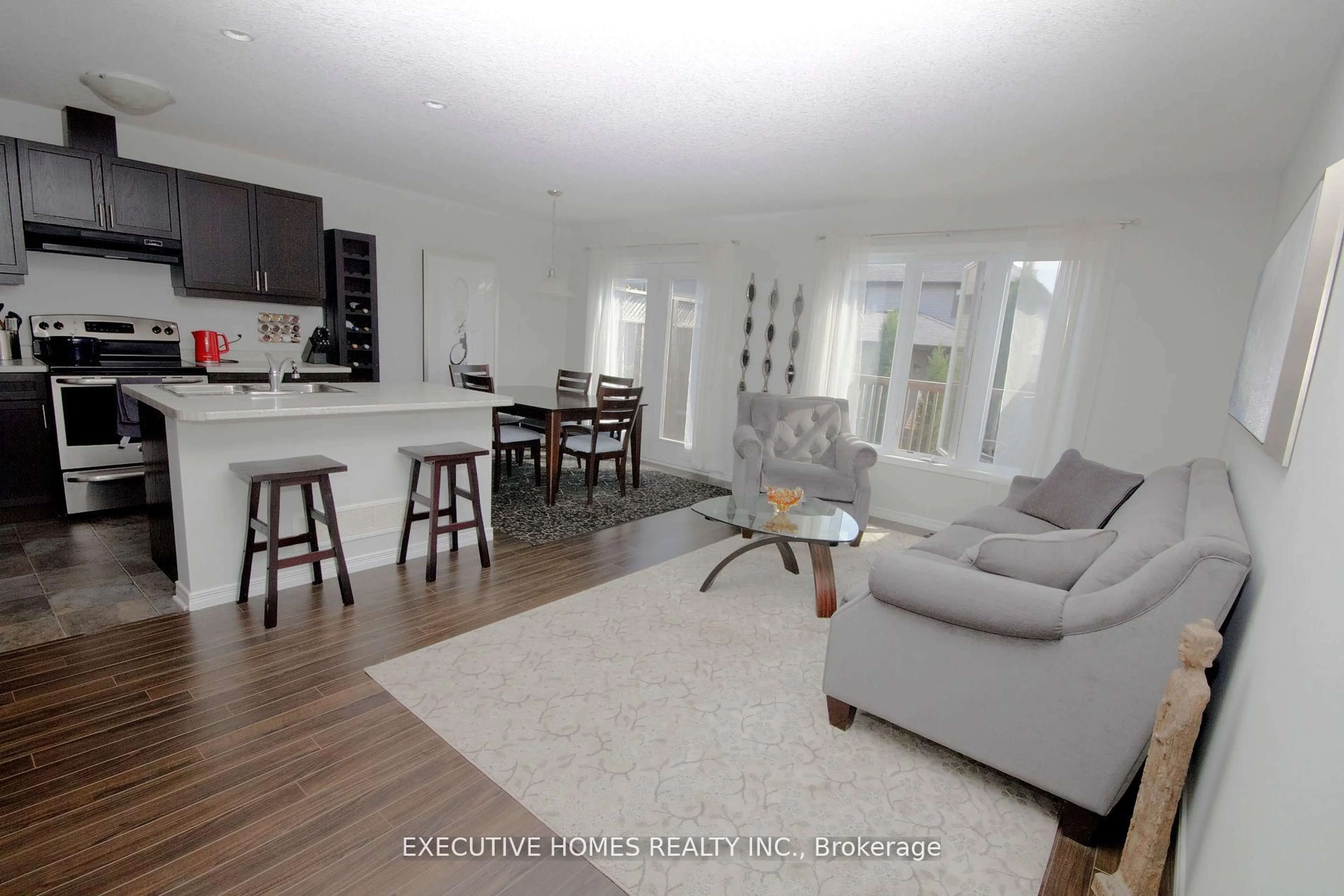 Living room with furniture, unknown for 2635 Bateman Tr #129, London South Ontario N6L 0B1
