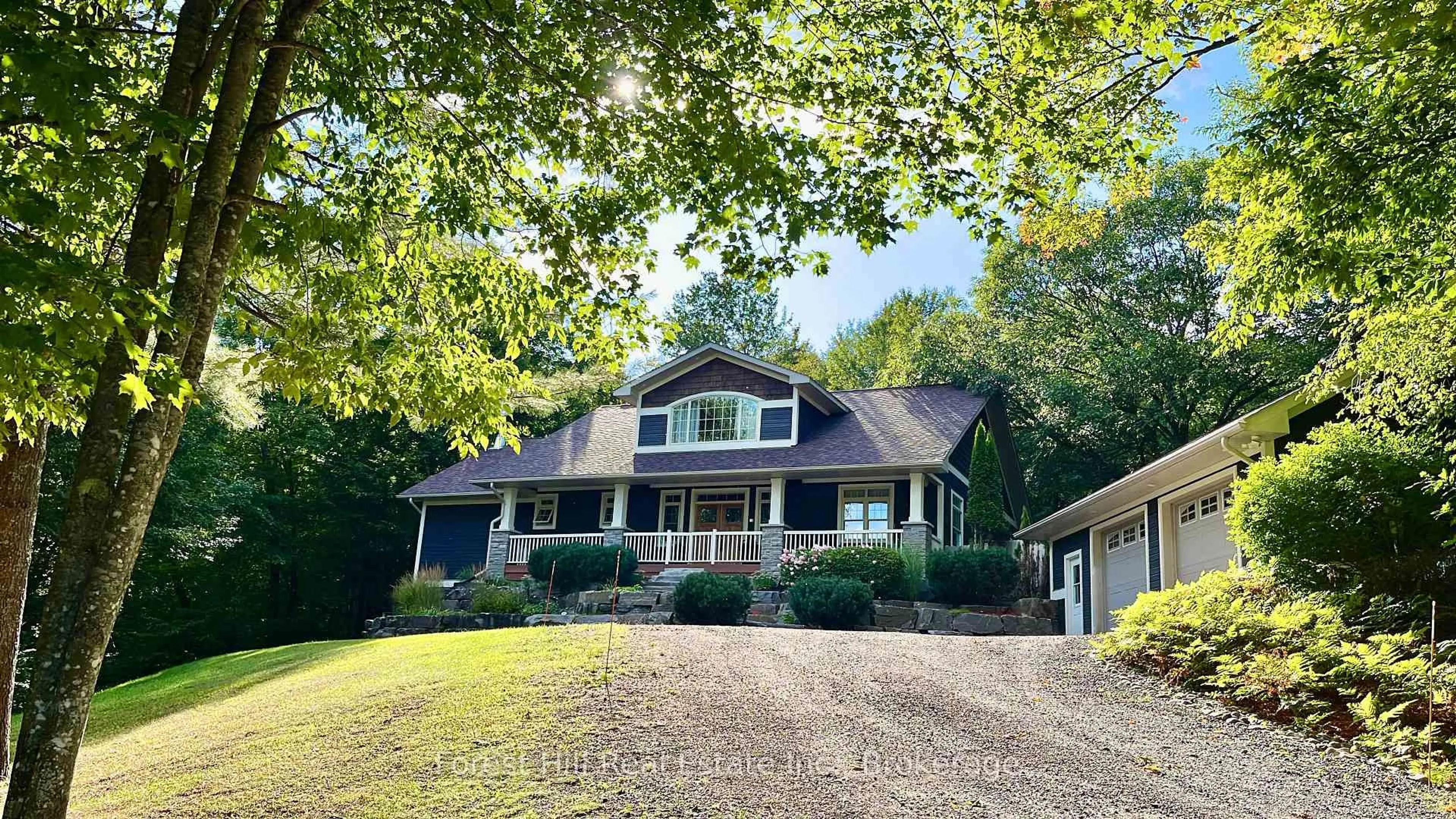A pic from outside/outdoor area/front of a property/back of a property/a pic from drone, unknown for 1474 Etwell Rd, Huntsville Ontario P1H 2J2