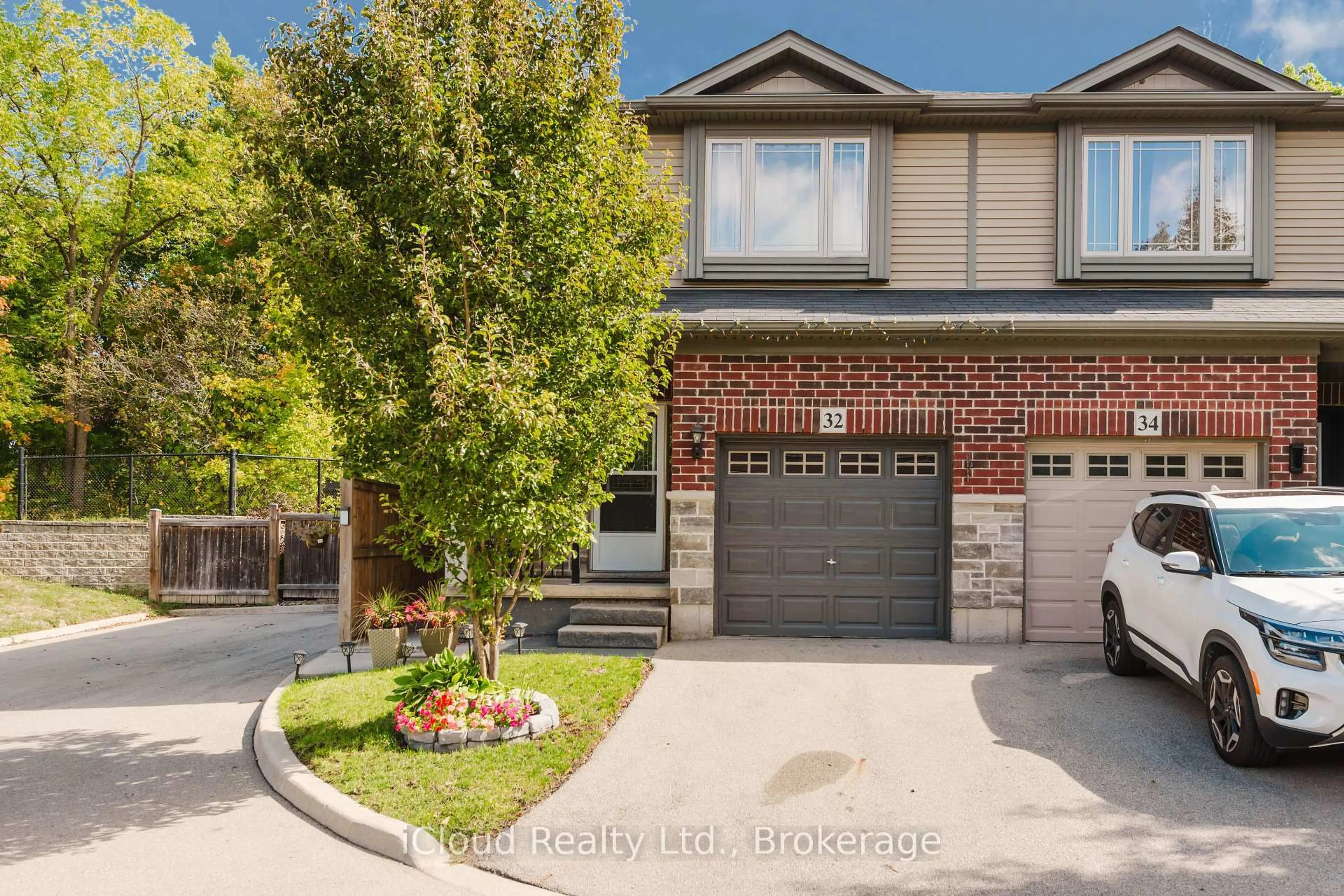 Home with brick exterior material, street for 32 Rolling Lane, Hamilton Ontario L8K 0A1
