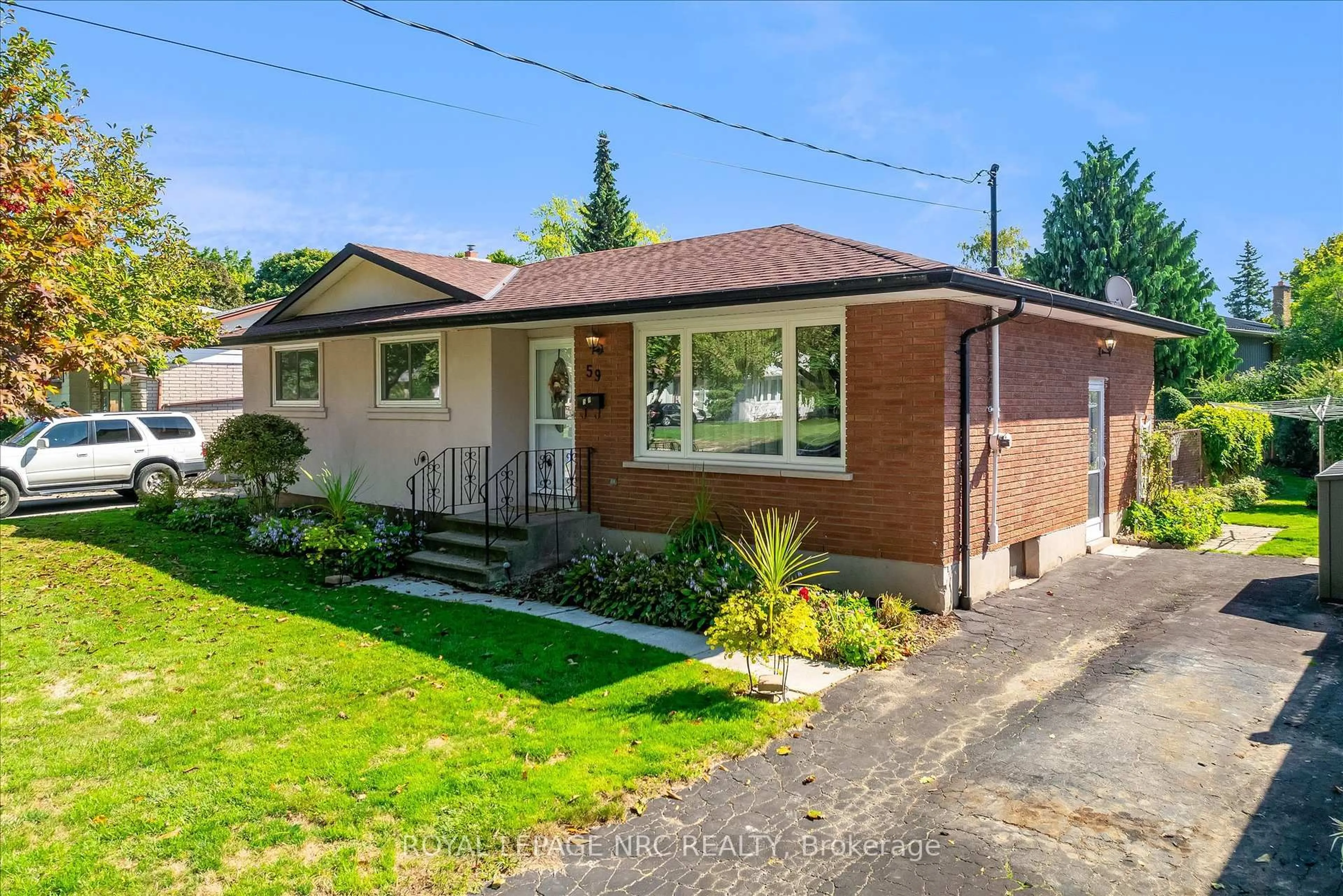 Home with brick exterior material, street for 59 Croydon Dr, St. Catharines Ontario L2M 1J6