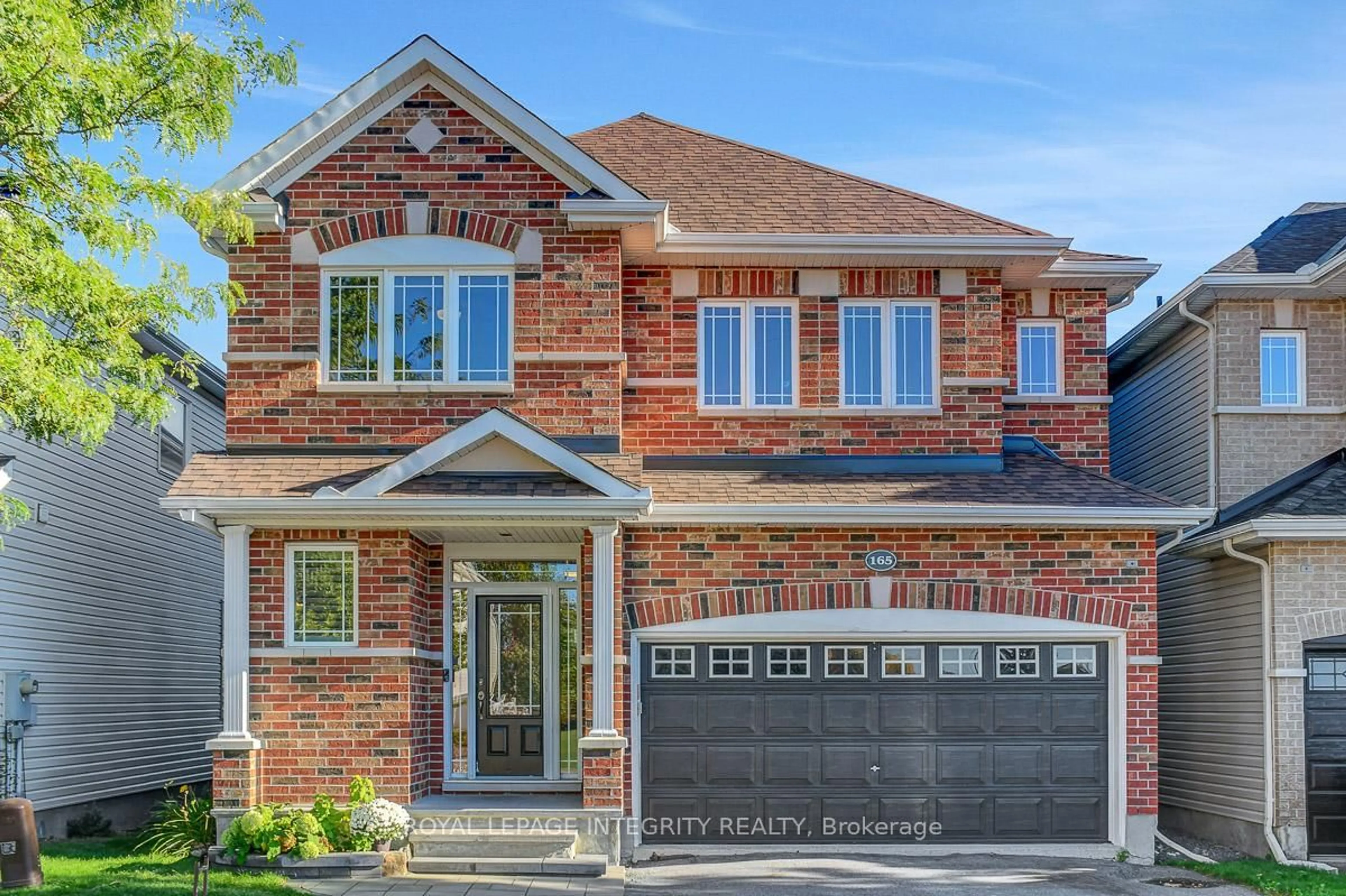 Home with brick exterior material, street for 165 Saltspring Private, Kanata Ontario K2M 0B1