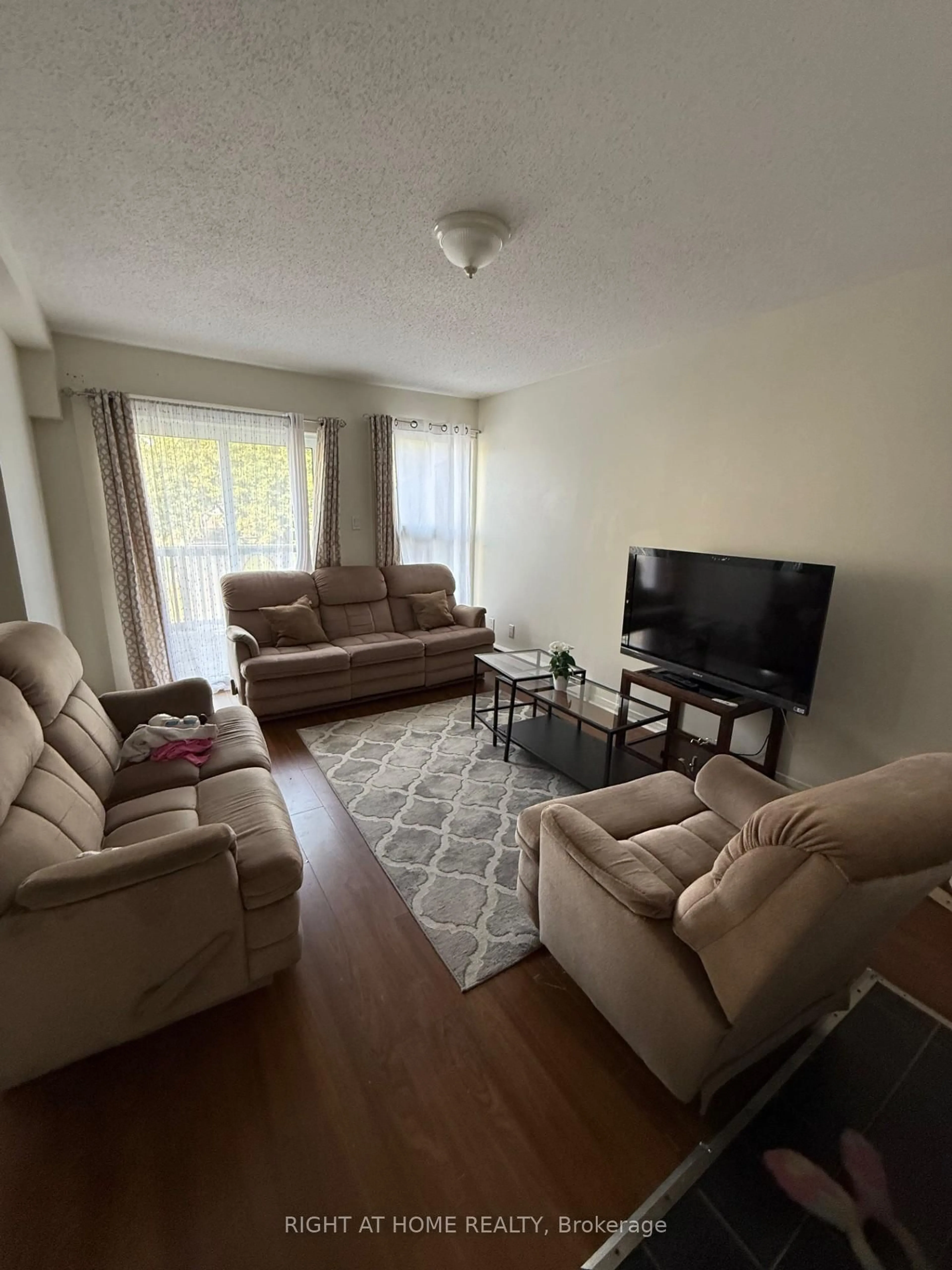 Living room with furniture, unknown for 3415 Uplands Dr #5, Ottawa Ontario K1V 9N3
