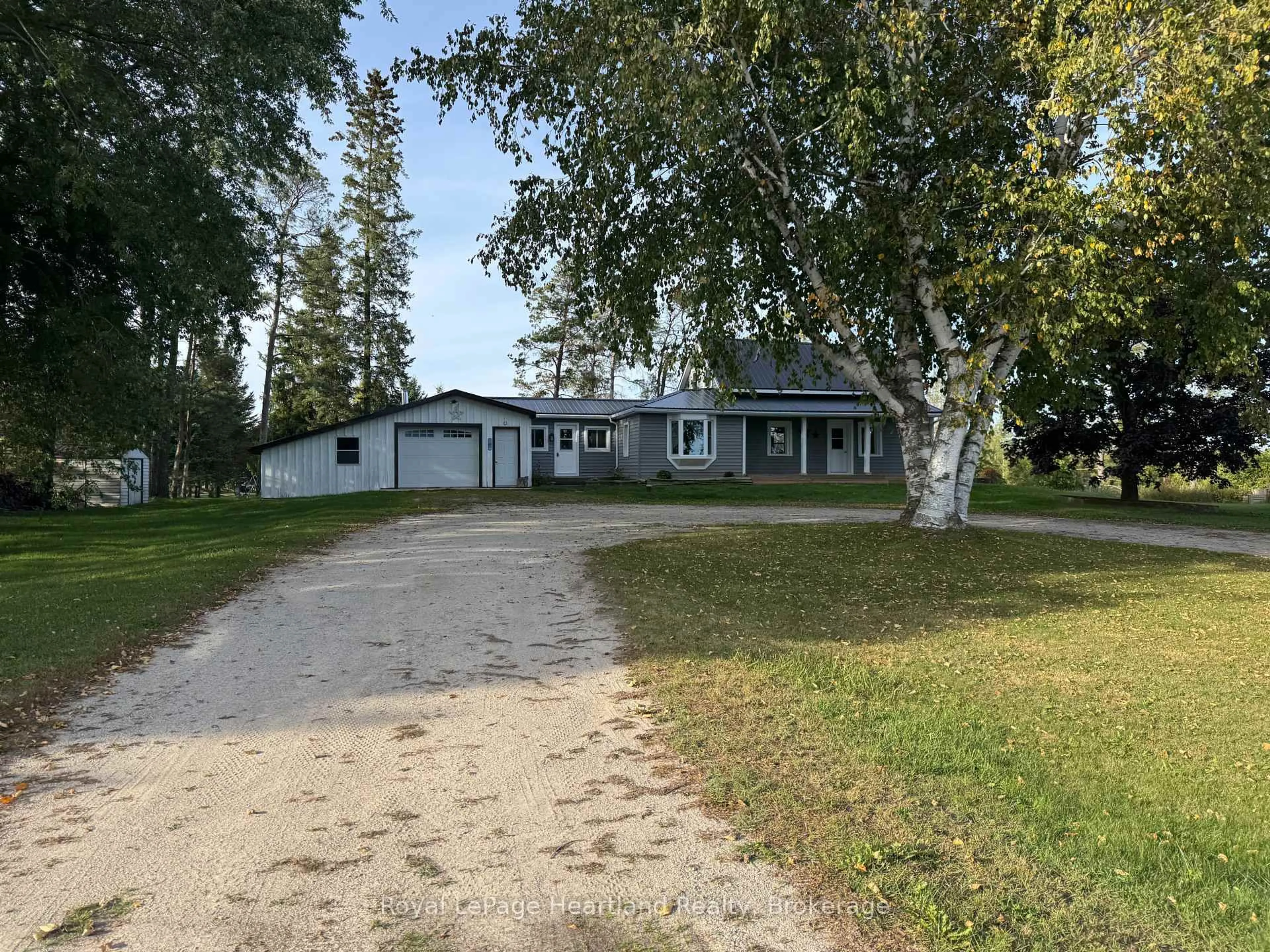 A pic from outside/outdoor area/front of a property/back of a property/a pic from drone, street for 341149 Grey Rd 28, West Grey Ontario N4N 3B9