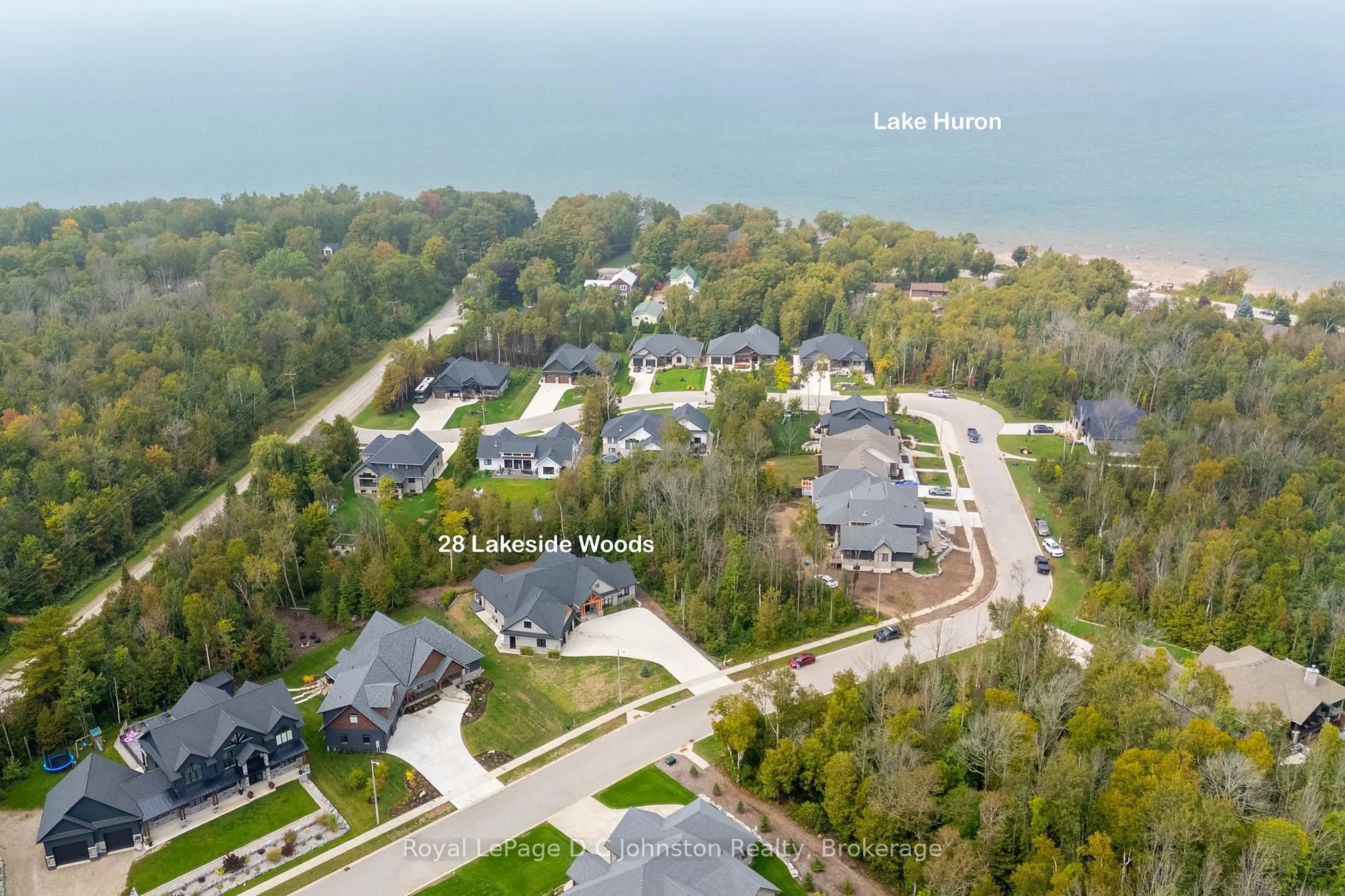 A pic from outside/outdoor area/front of a property/back of a property/a pic from drone, water/lake/river/ocean view for 28 Lakeside Woods Cres, Saugeen Shores Ontario N0H 2C6