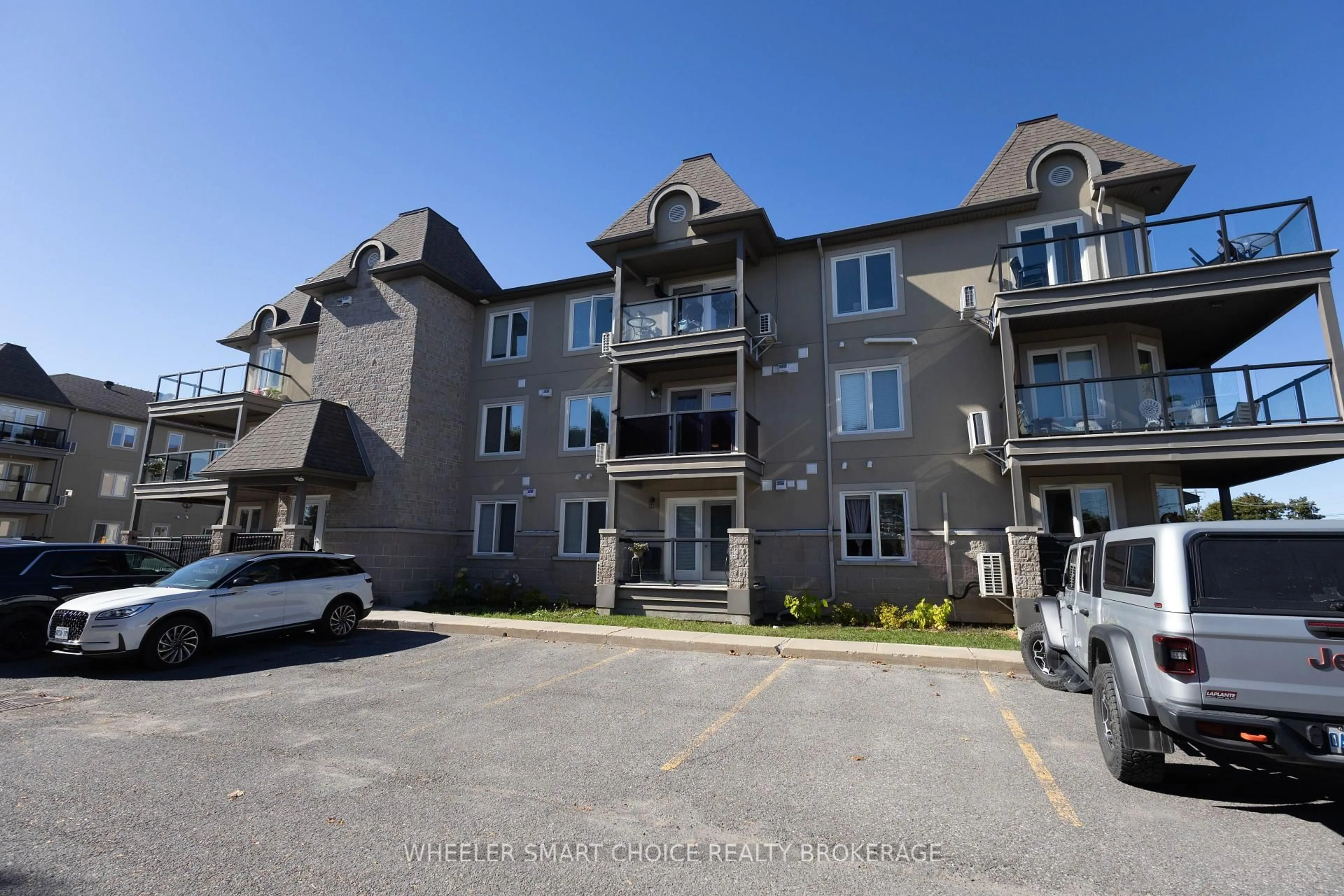 A pic from outside/outdoor area/front of a property/back of a property/a pic from drone, unknown for 775 Brefeuf St #206, Casselman Ontario K0A 1M0