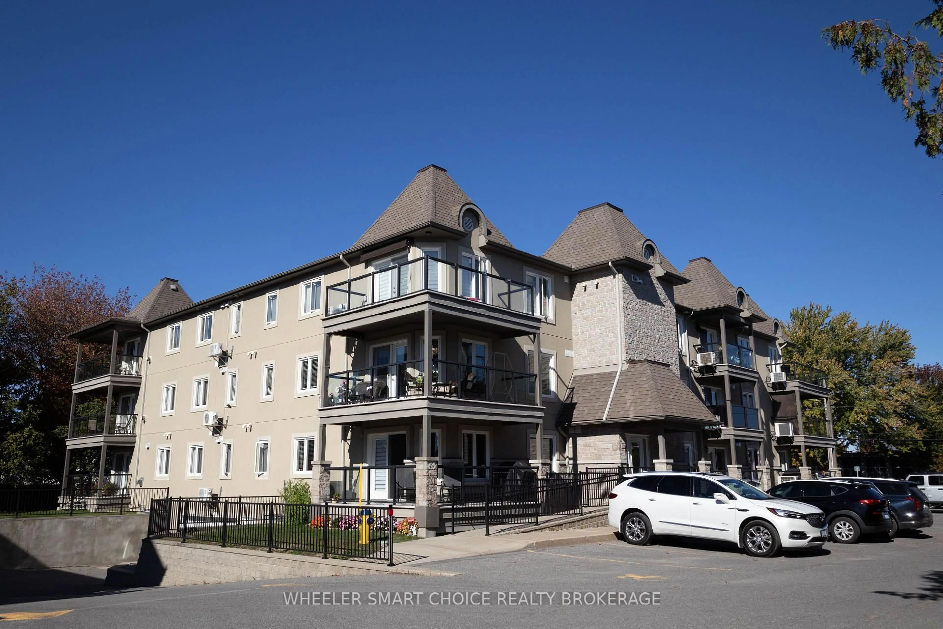 A pic from outside/outdoor area/front of a property/back of a property/a pic from drone, street for 775 Brefeuf St #206, Casselman Ontario K0A 1M0