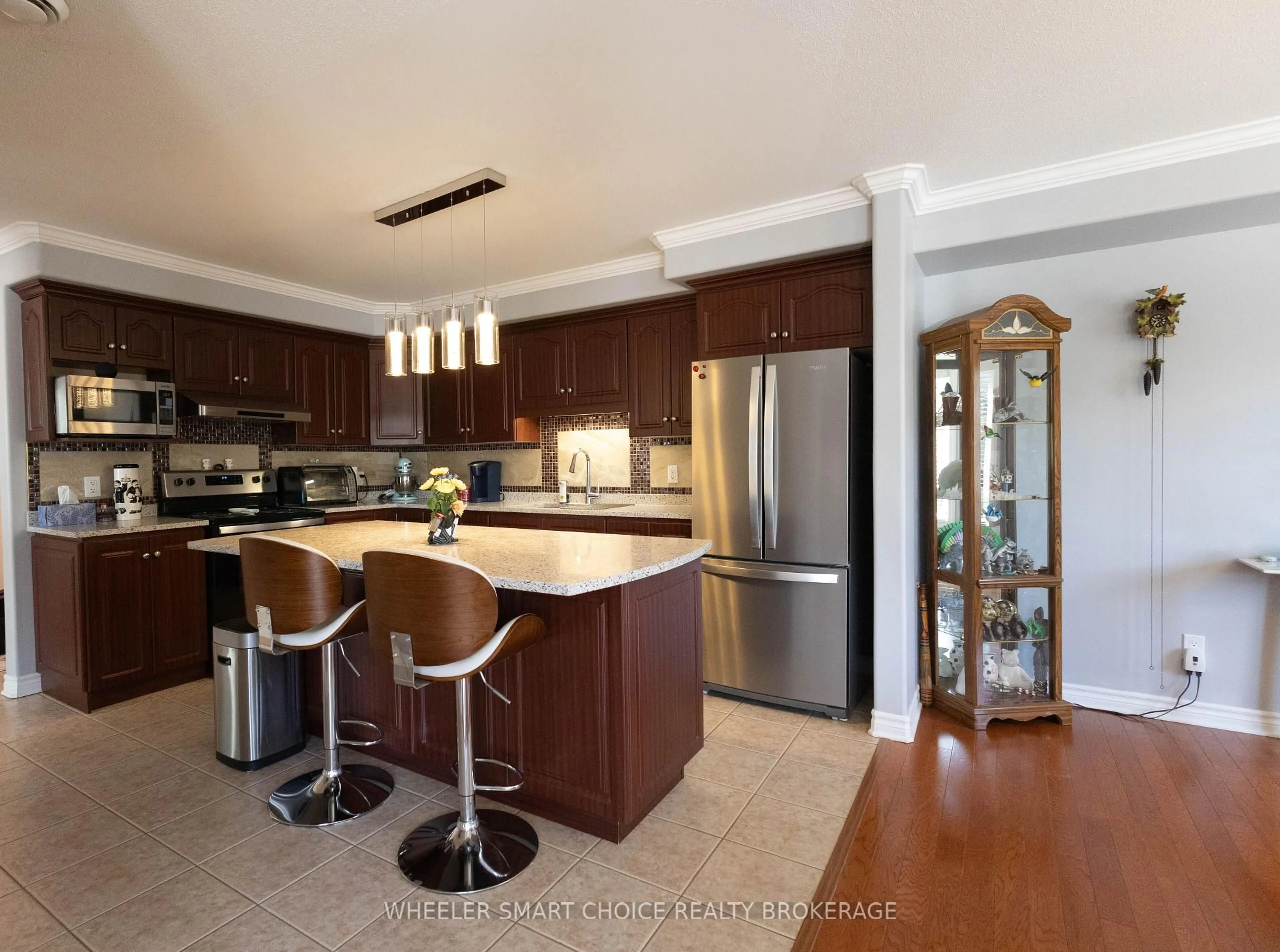 Open concept kitchen, ceramic/tile floor for 775 Brefeuf St #206, Casselman Ontario K0A 1M0