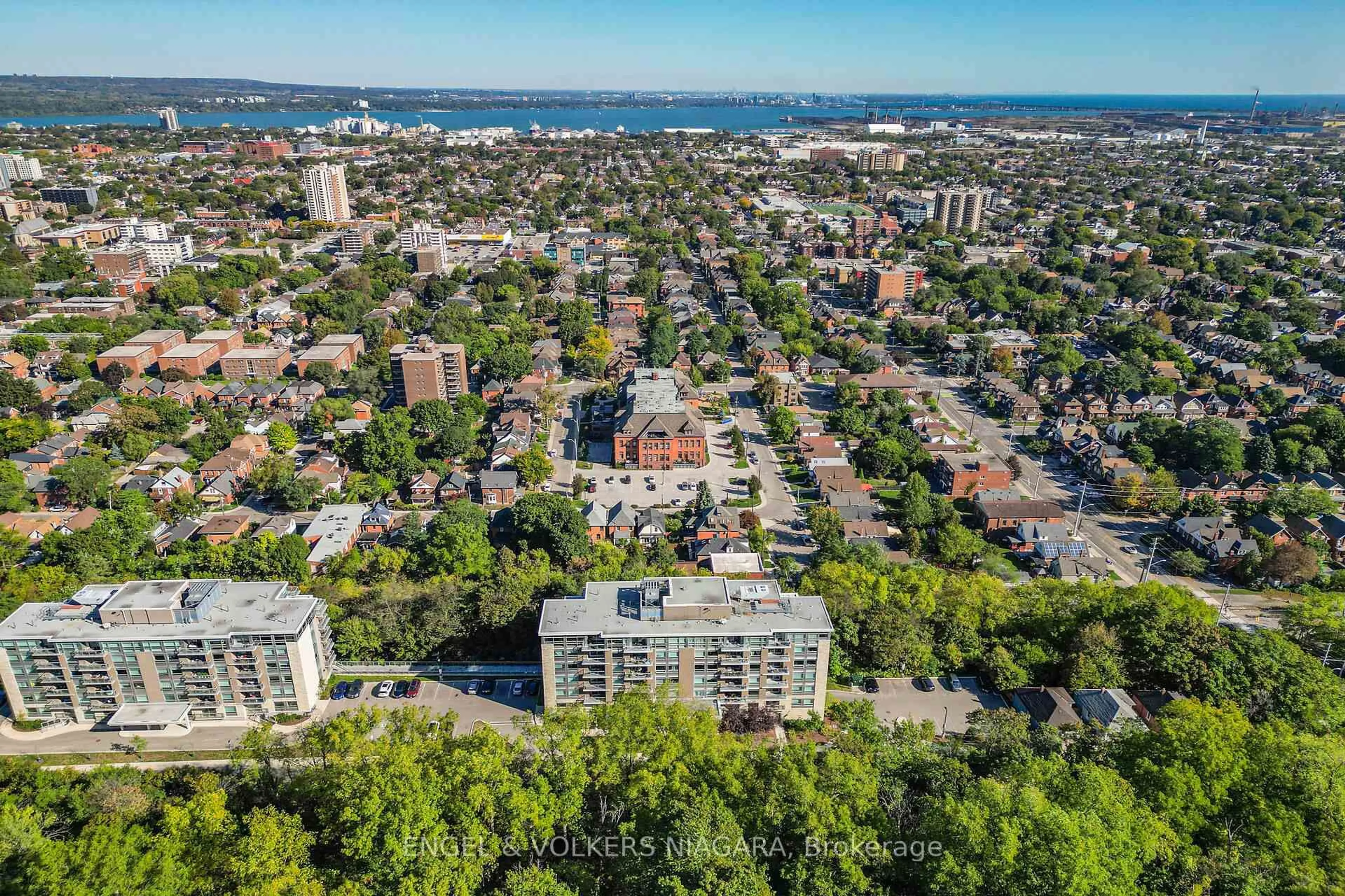 A pic from outside/outdoor area/front of a property/back of a property/a pic from drone, city buildings view from balcony for 479 Charlton Ave #106, Hamilton Ontario L8N 0B4