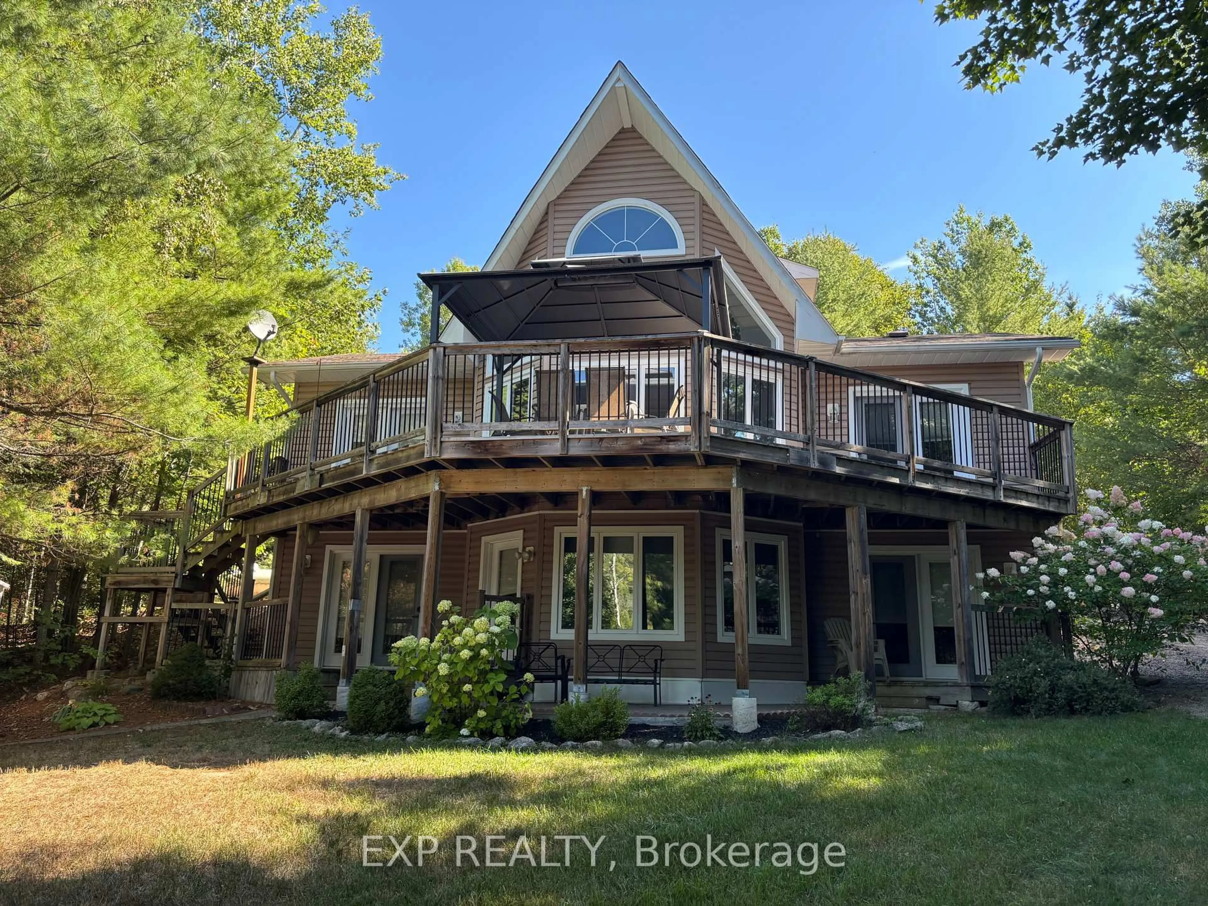 A pic from outside/outdoor area/front of a property/back of a property/a pic from drone, water/lake/river/ocean view for 134 Carson Heights Rd, Barry's Bay Ontario K0J 1B0