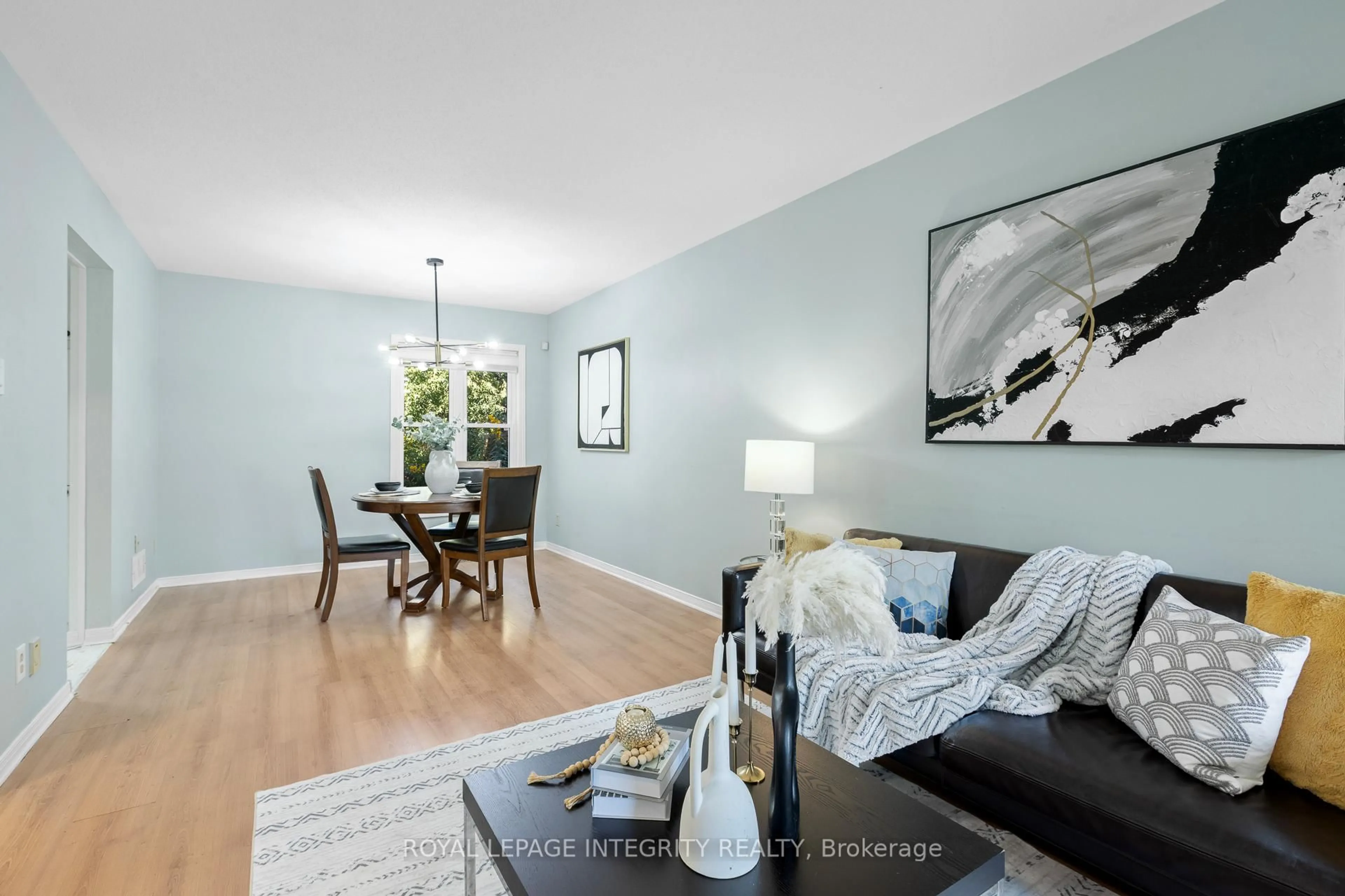 Living room with furniture, wood/laminate floor for 11 Royal Field Cres, Ottawa Ontario K2J 4G1
