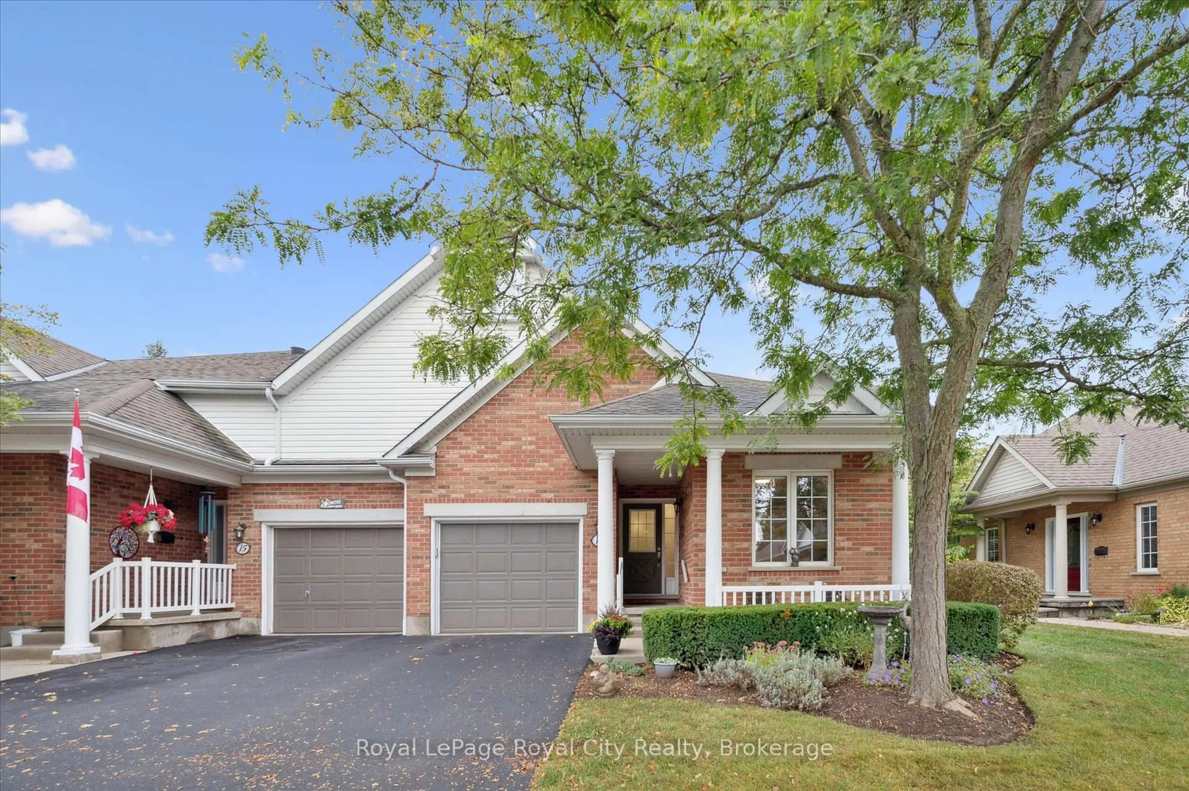 Home with brick exterior material, street for 11 Magnolia Lane, Guelph Ontario N1G 4X7